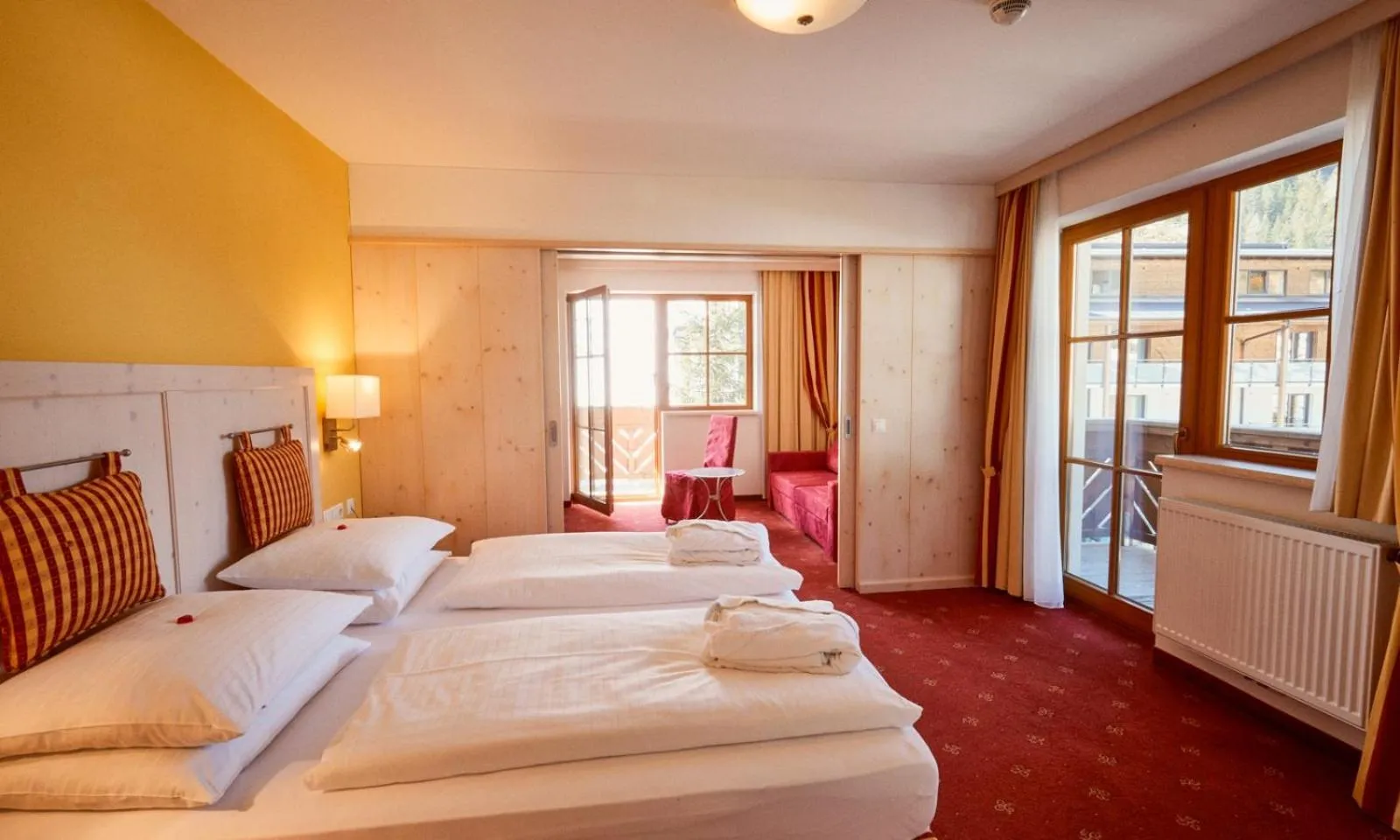 Bed in Hotel Enzian by Alpeffect Hotels