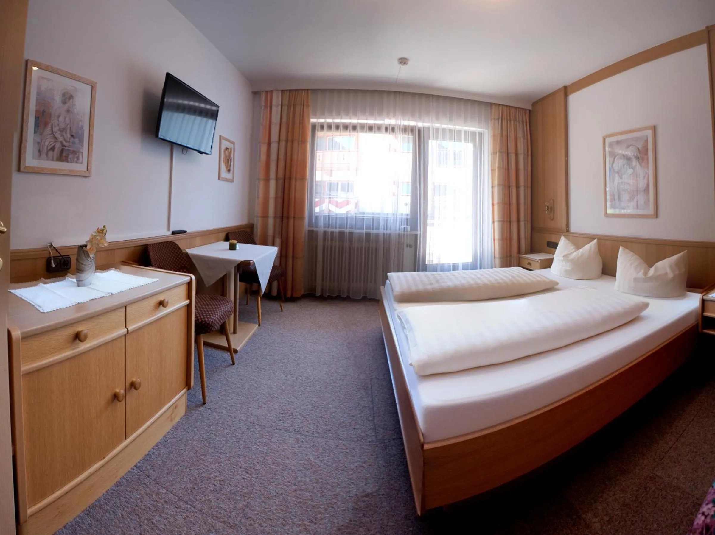 Bed in Hotel Garni Jennewein