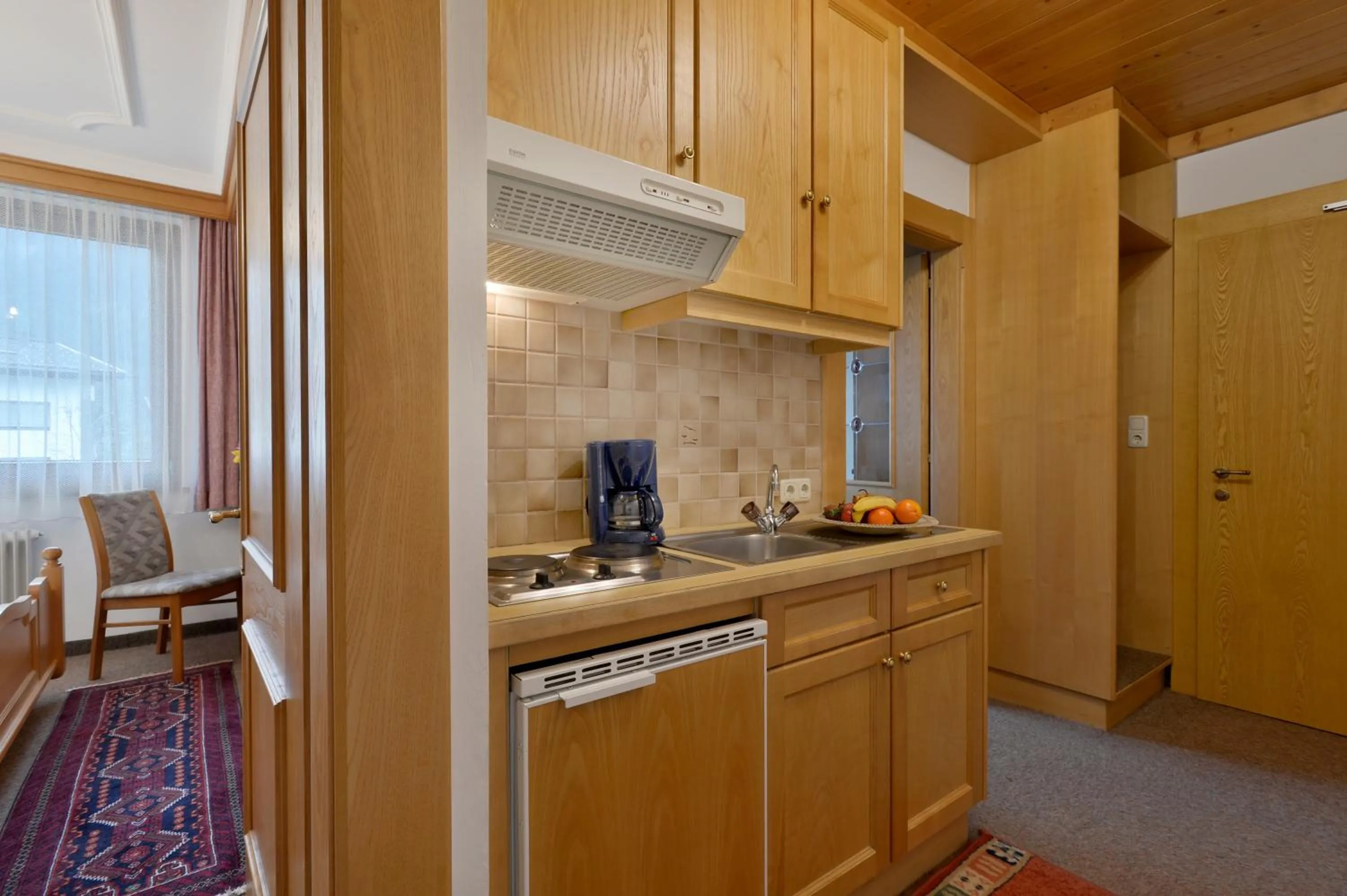 Kitchen or kitchenette in Hotel Garni Jennewein