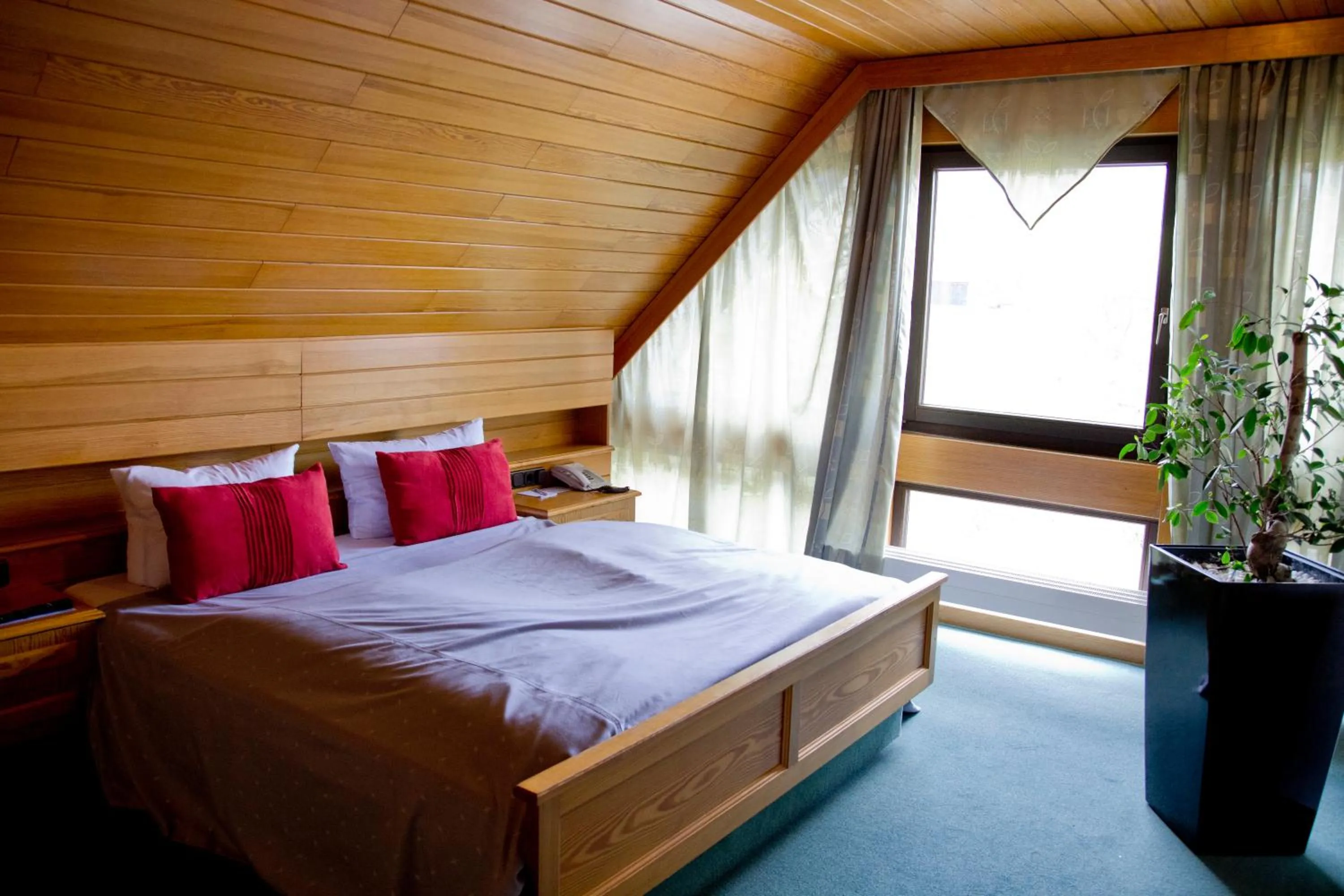 Bed in Hotel Kainsbacher Mühle