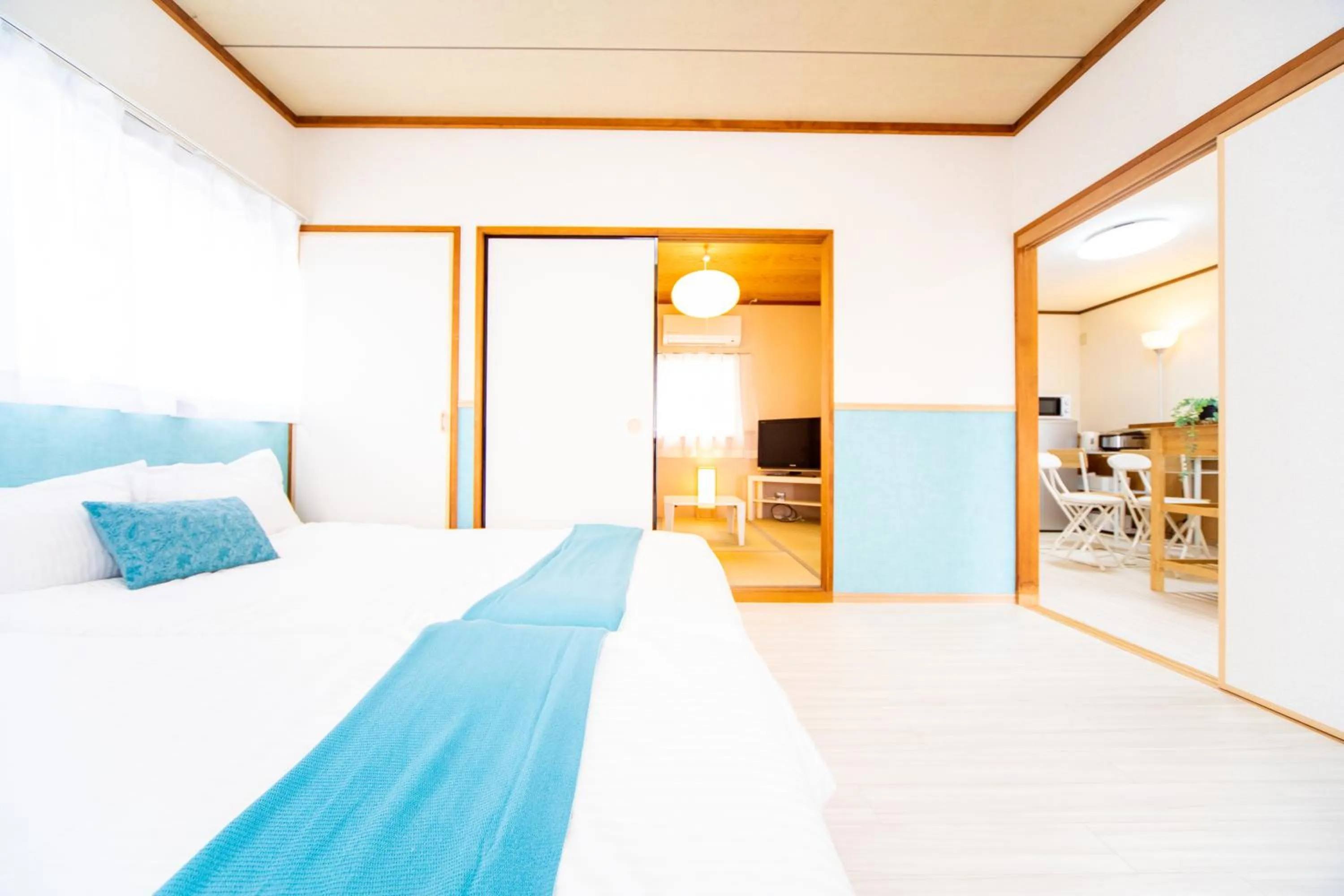 Bed in Awaji Central House in Kusumoto