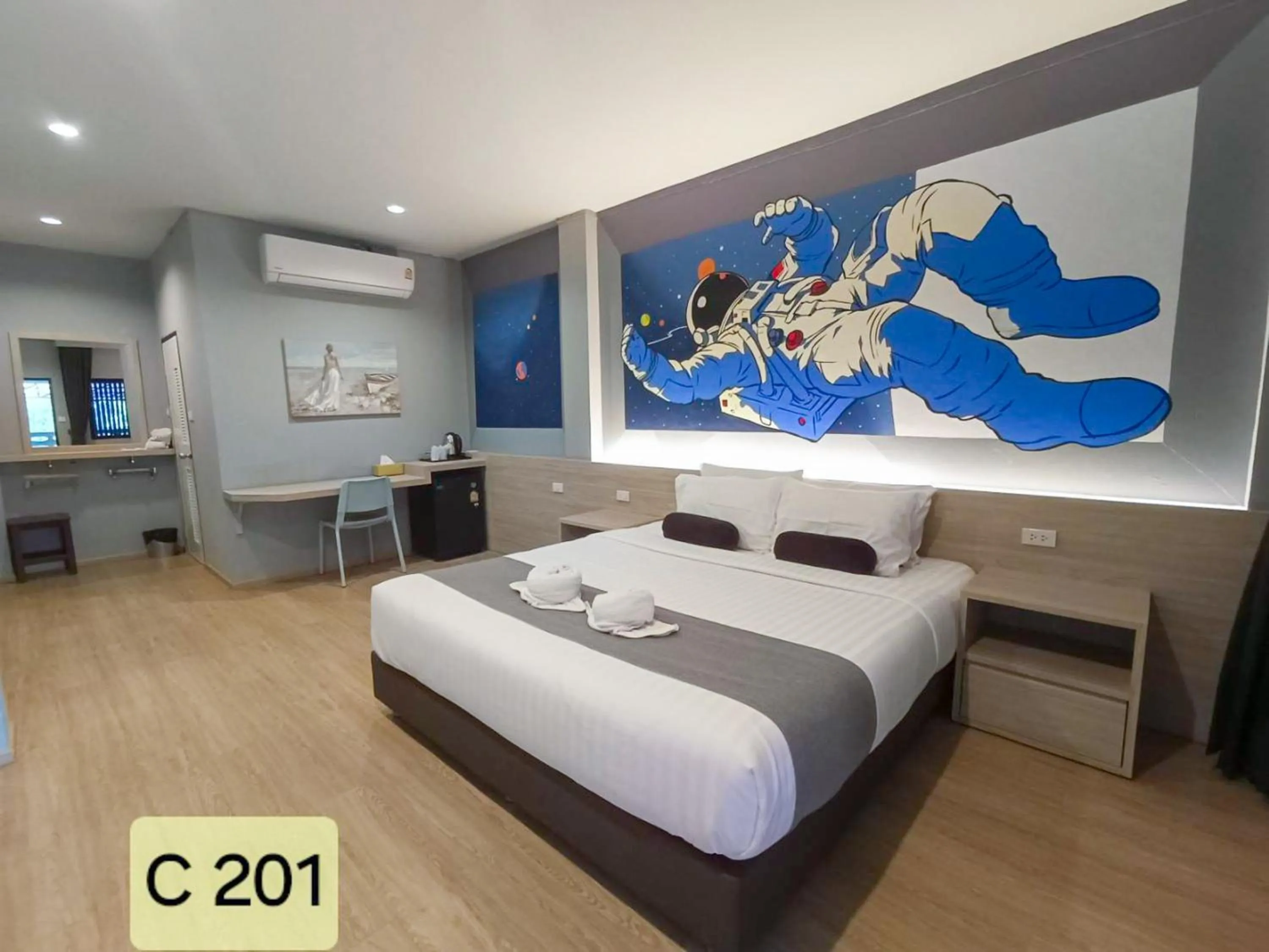 Bed in Tarnsiri Boutique Resort