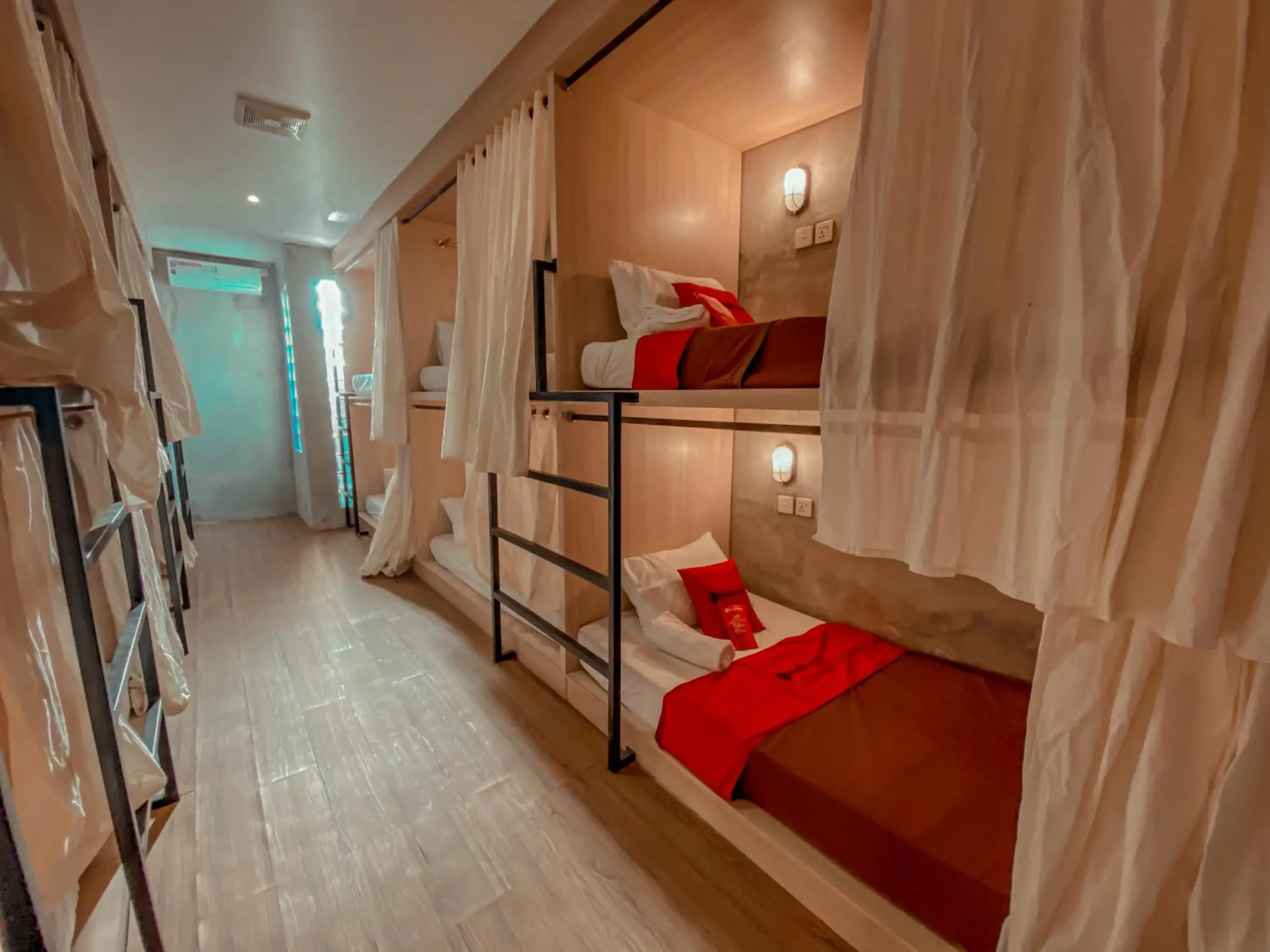 Single Bed in Mixed Dormitory Room in RedDoorz Hostel Near Ngurah Rai Airport Kuta Single Bed in Mixed Dormitory Room in RedDoorz Hostel Near Ngurah Rai Airport Kuta