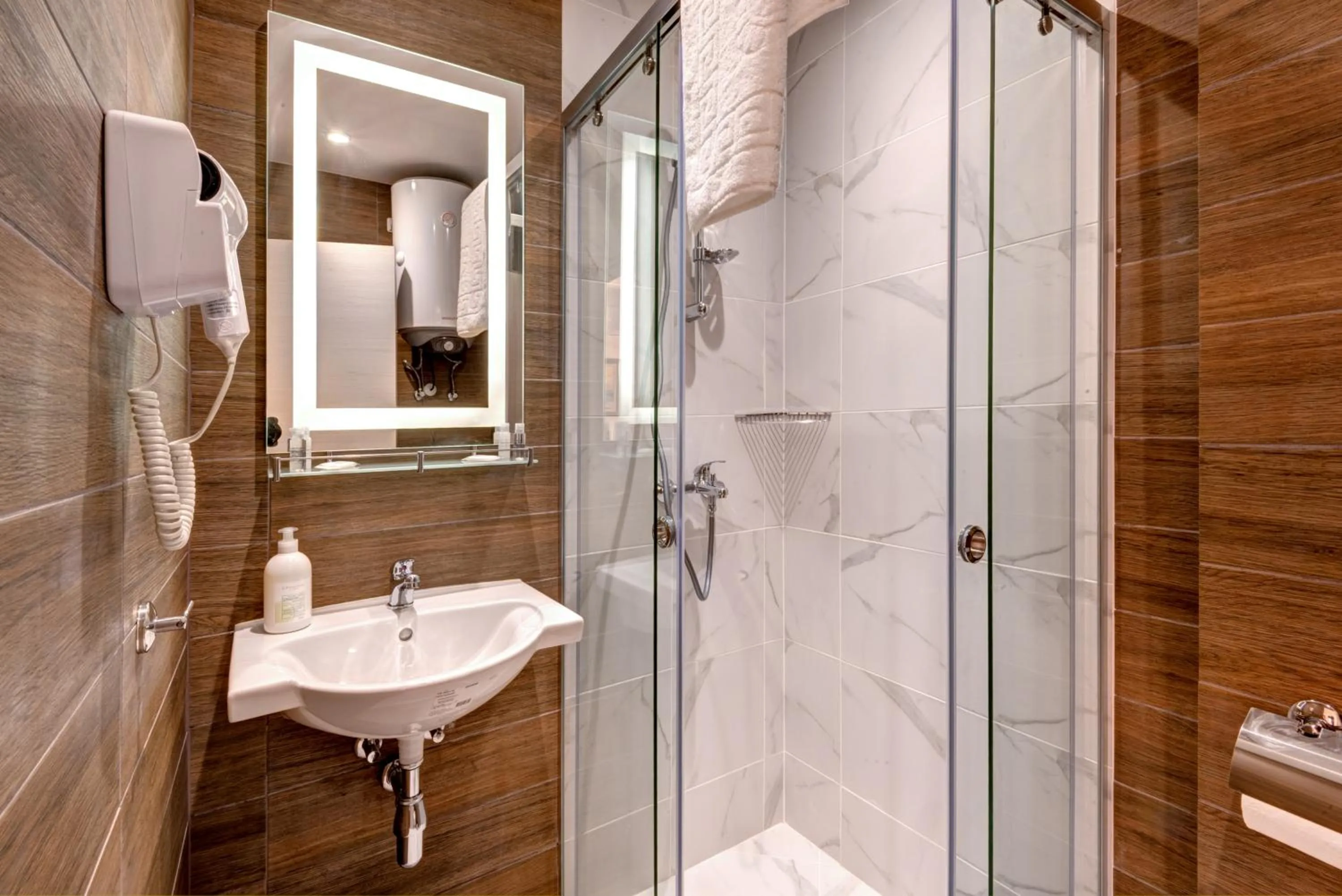 Bathroom in Panorama Blue Family Hotel and Free parking