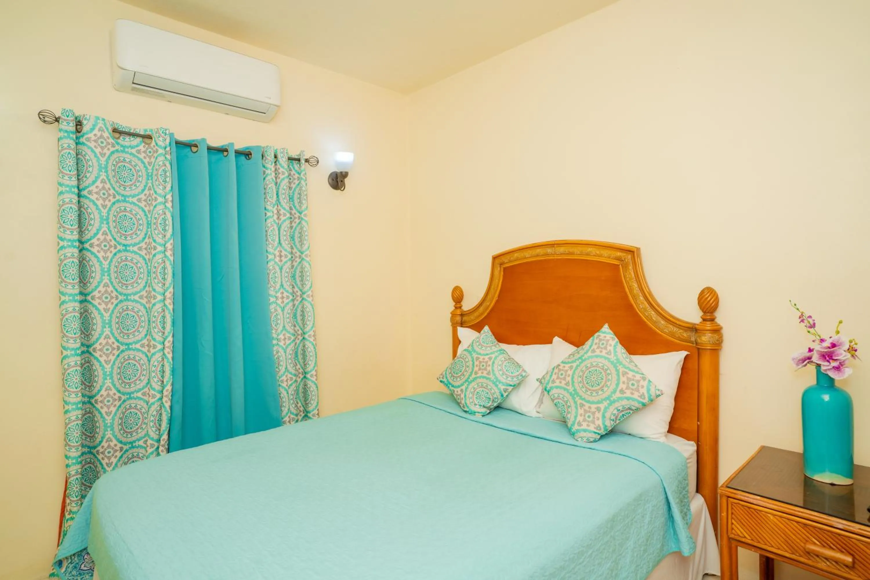 Bed in Connie's Comfort Suites