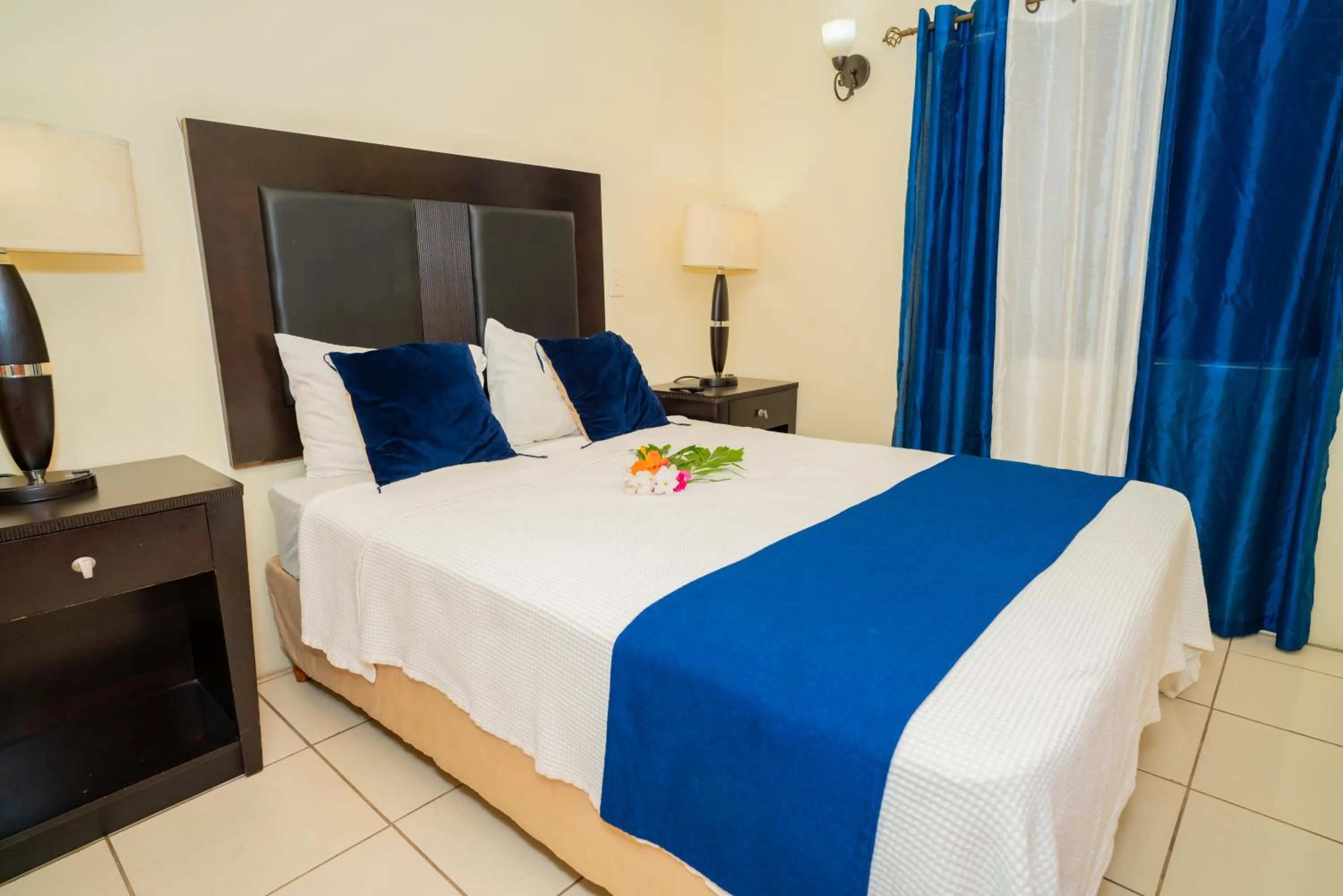 Bed in Connie's Comfort Suites