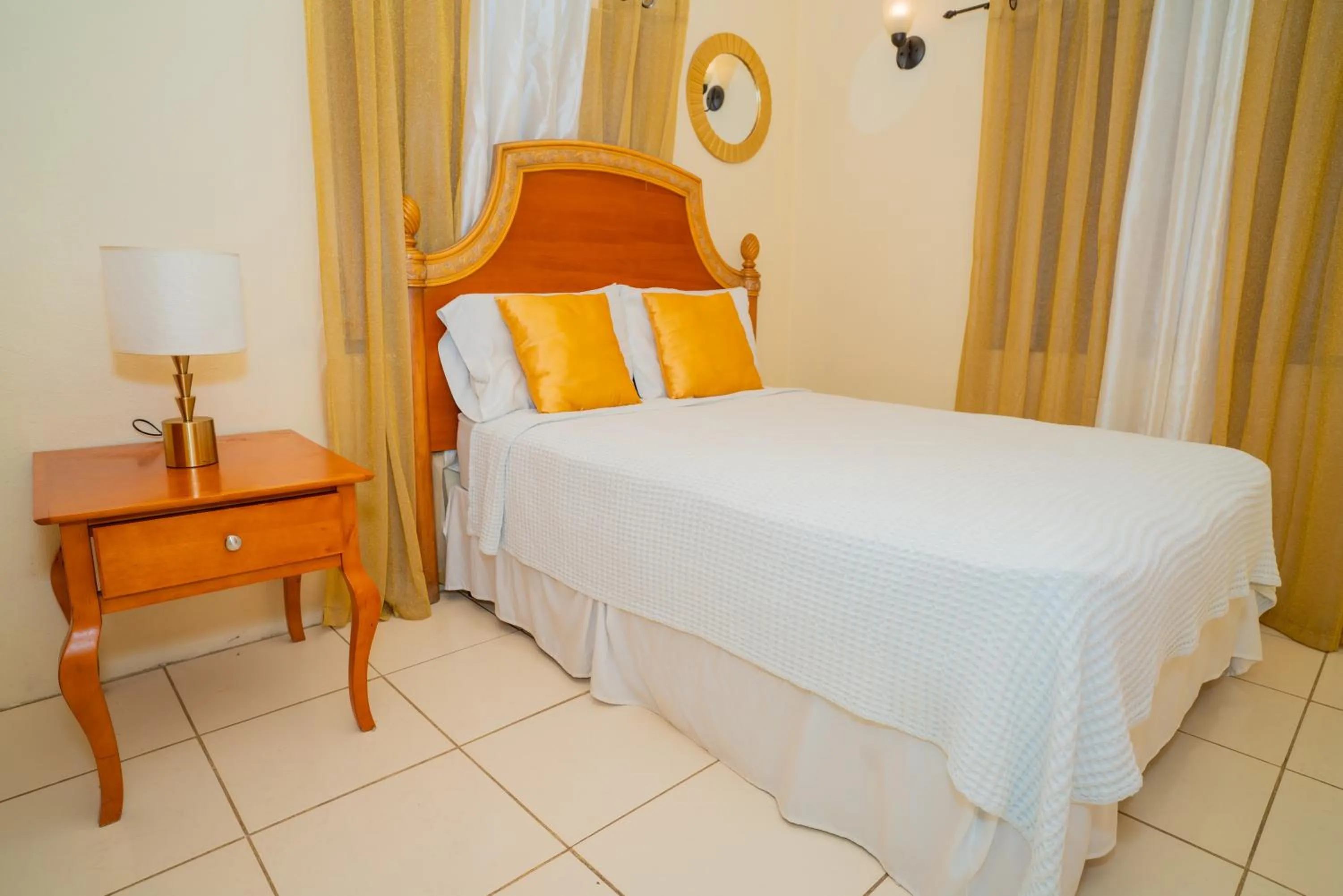 Bed in Connie's Comfort Suites