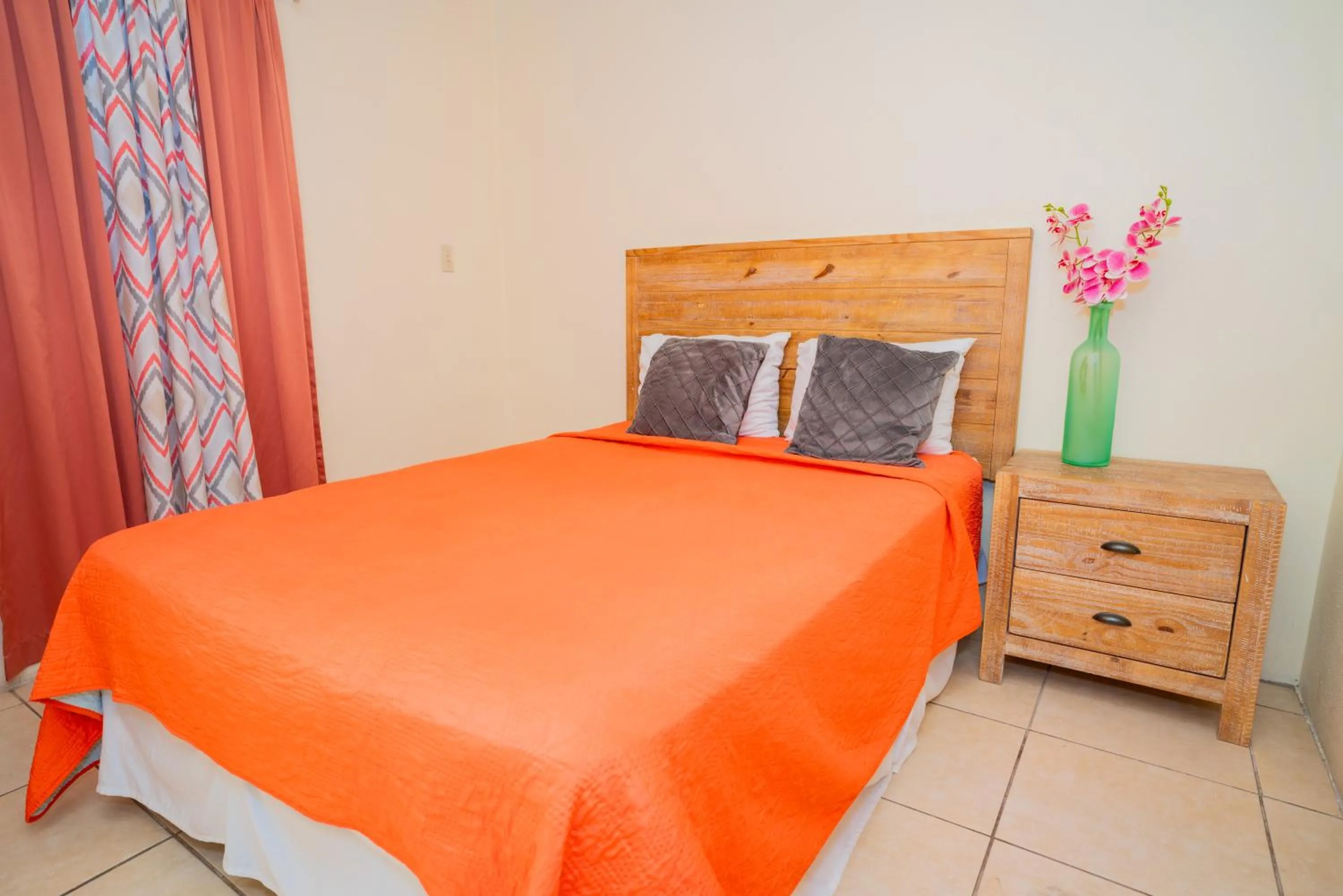 Bed in Connie's Comfort Suites