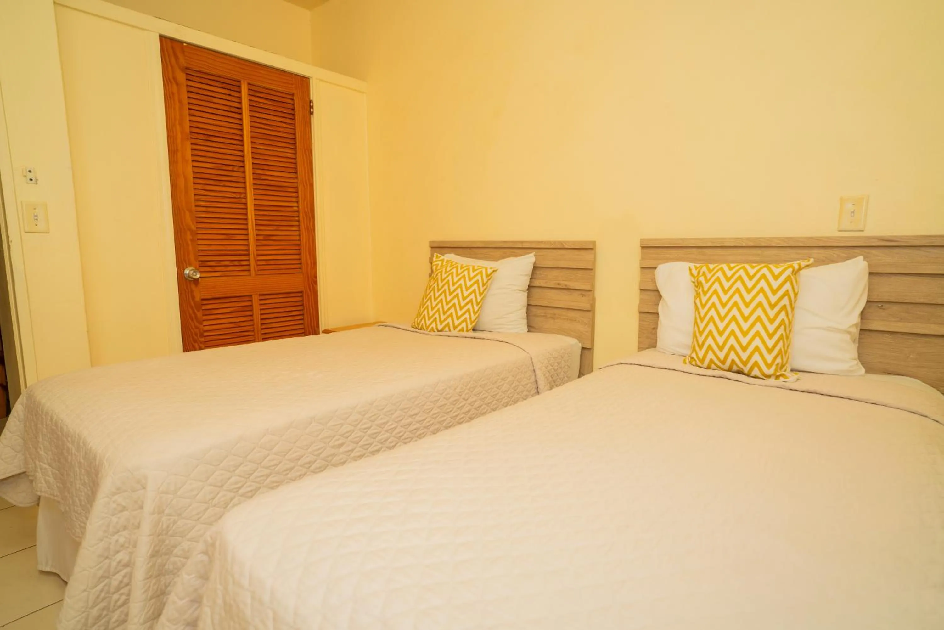 Bed in Connie's Comfort Suites