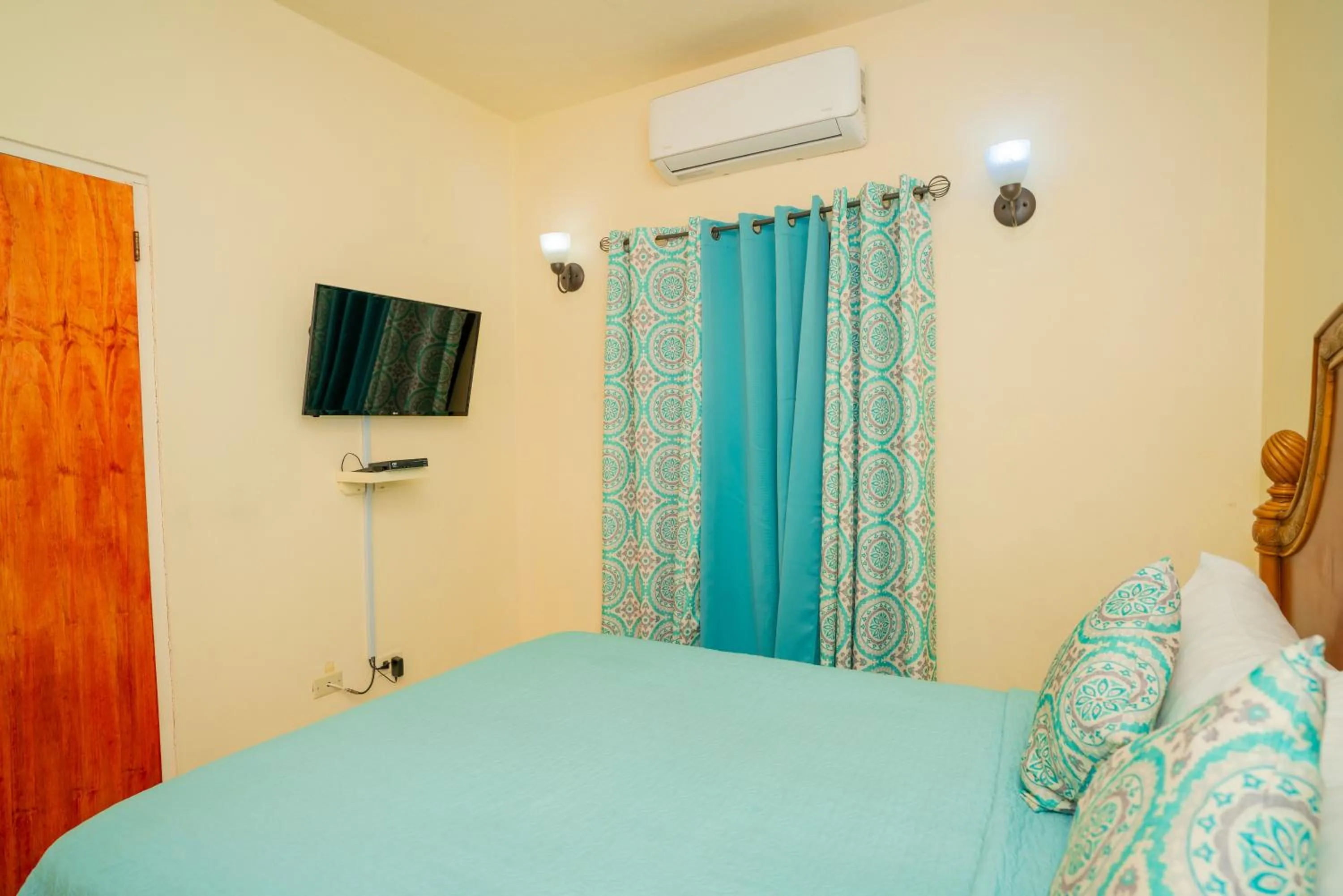 Bed in Connie's Comfort Suites