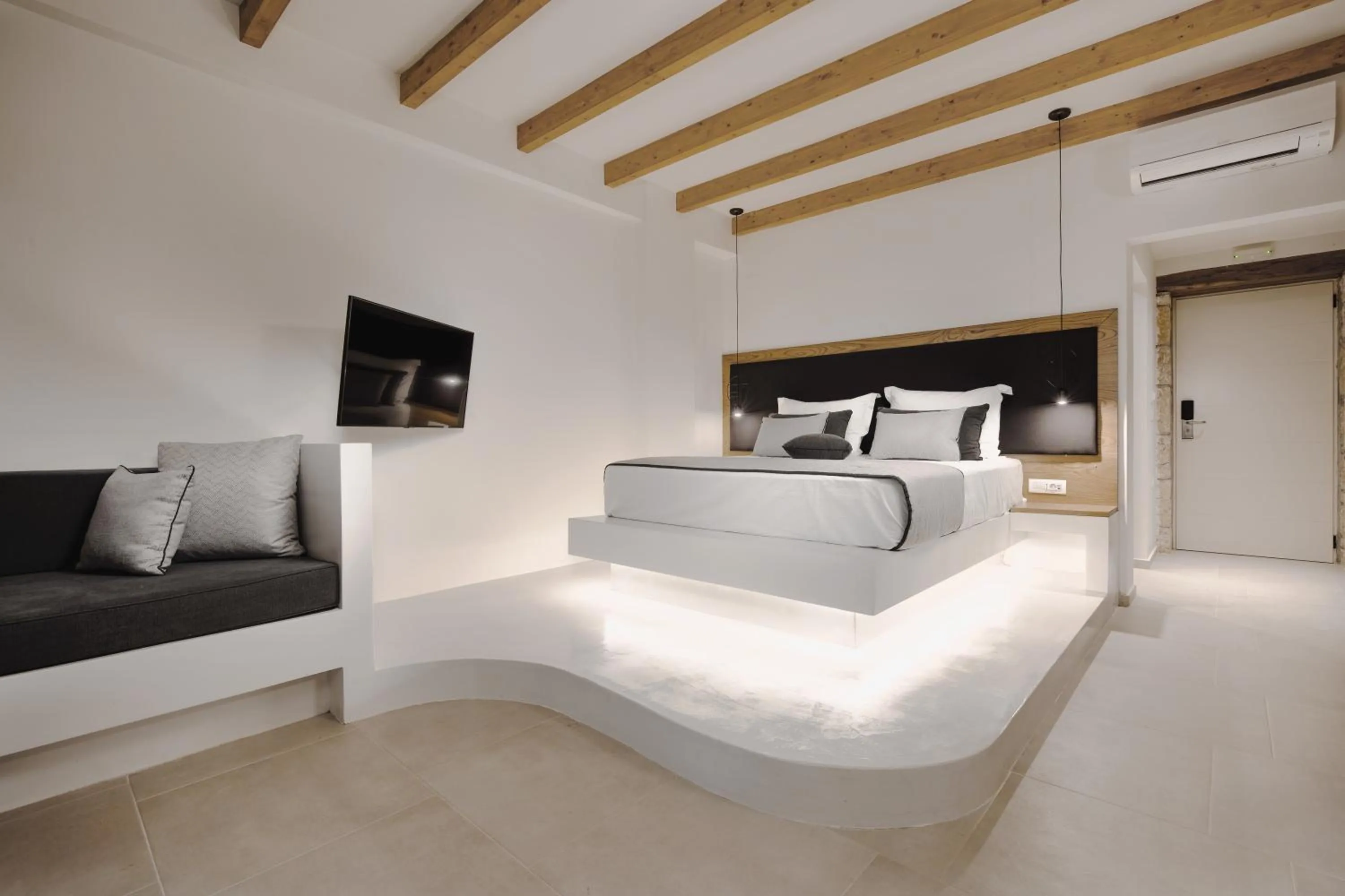 Bed in Aliv stone suites & spa