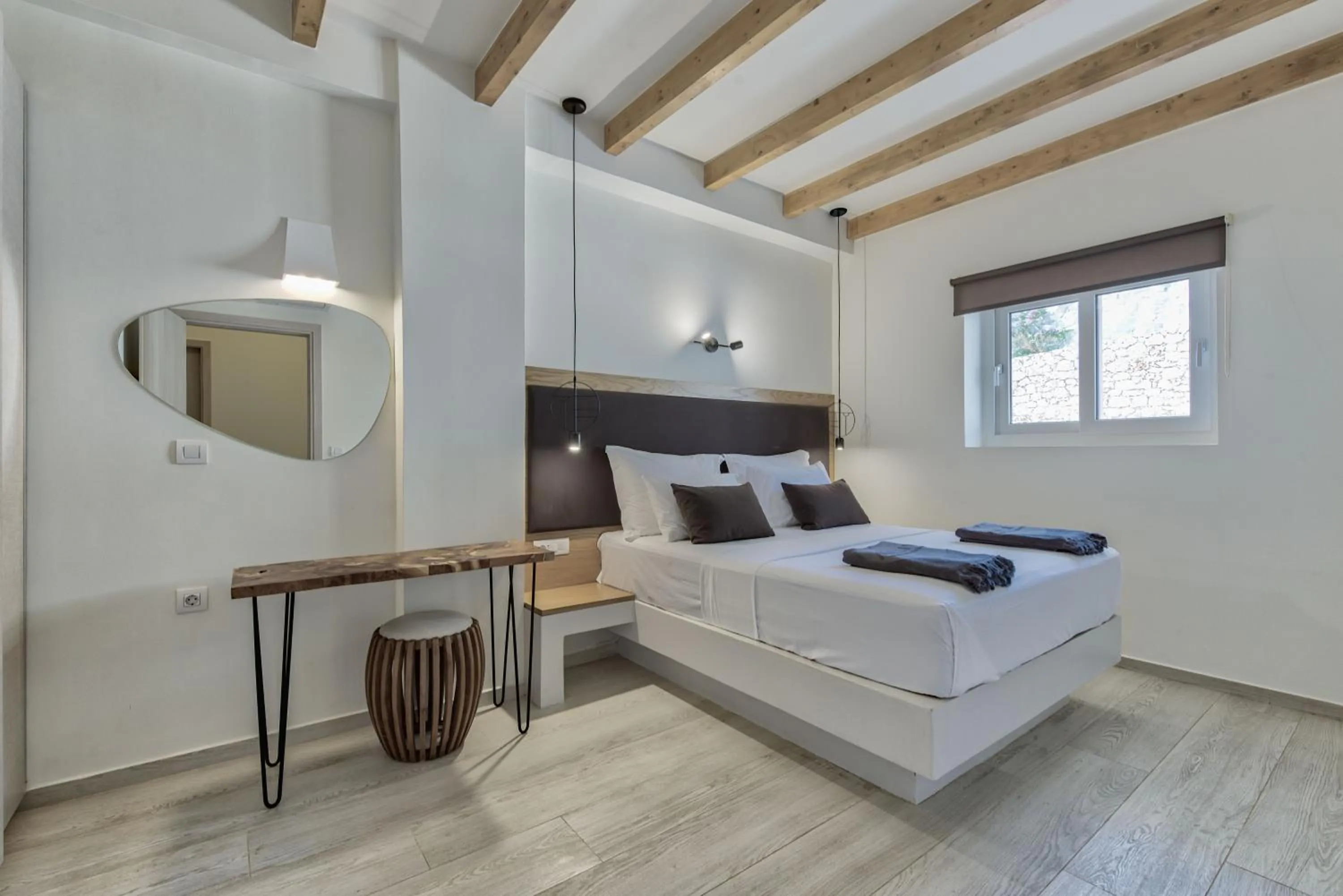 Bed in Aliv stone suites & spa