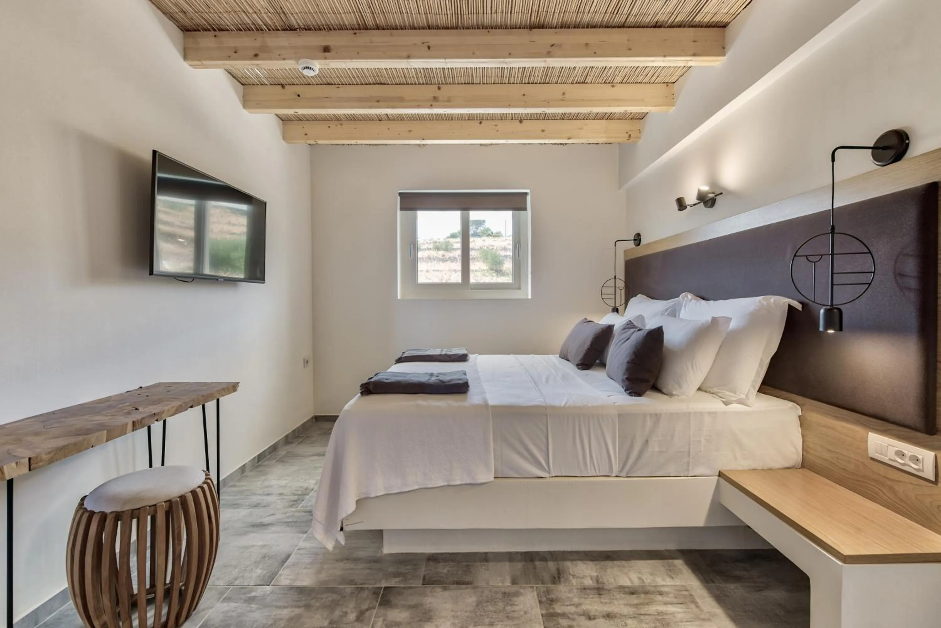 Bed in Aliv stone suites & spa