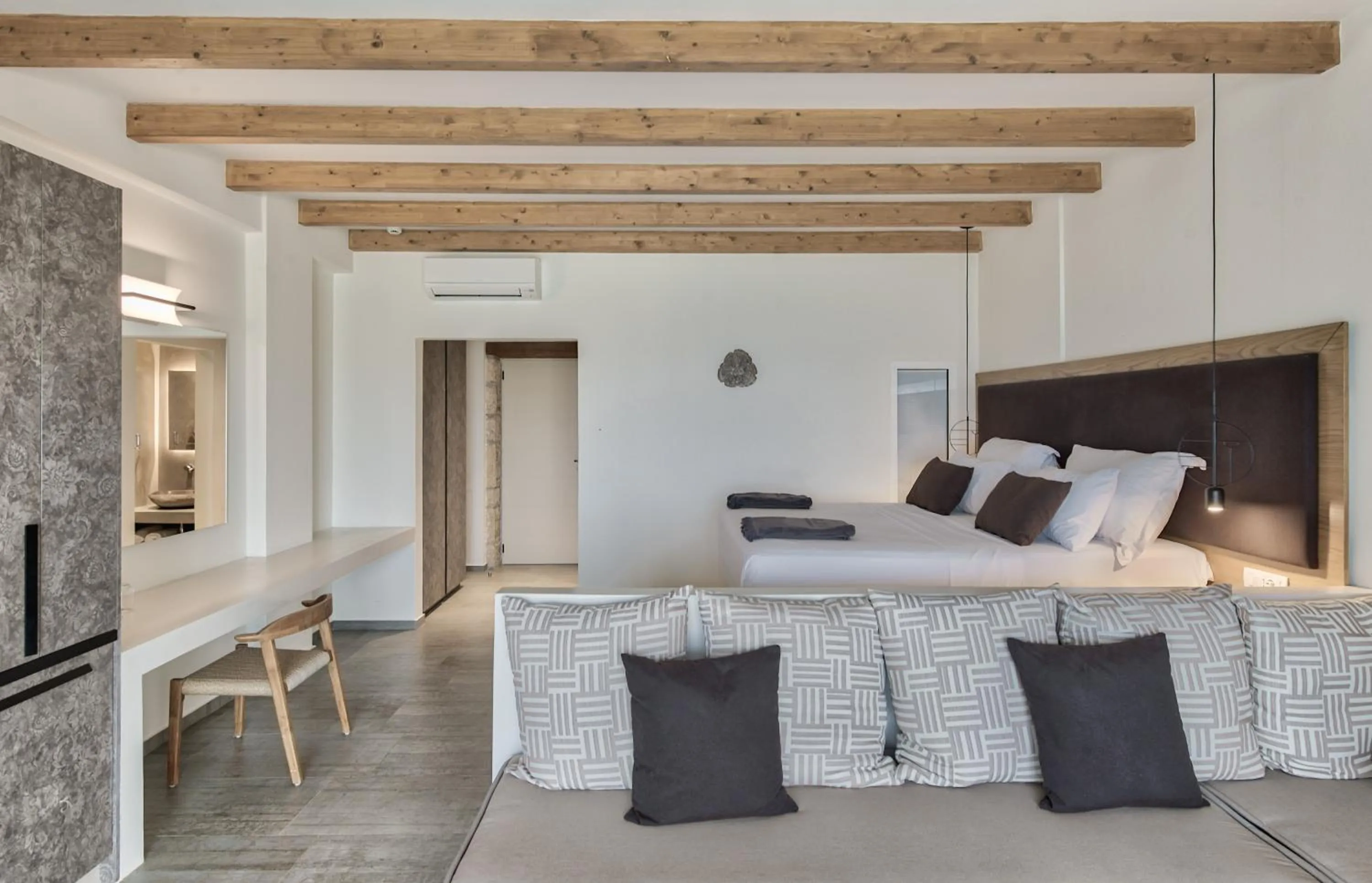 Bed in Aliv stone suites & spa