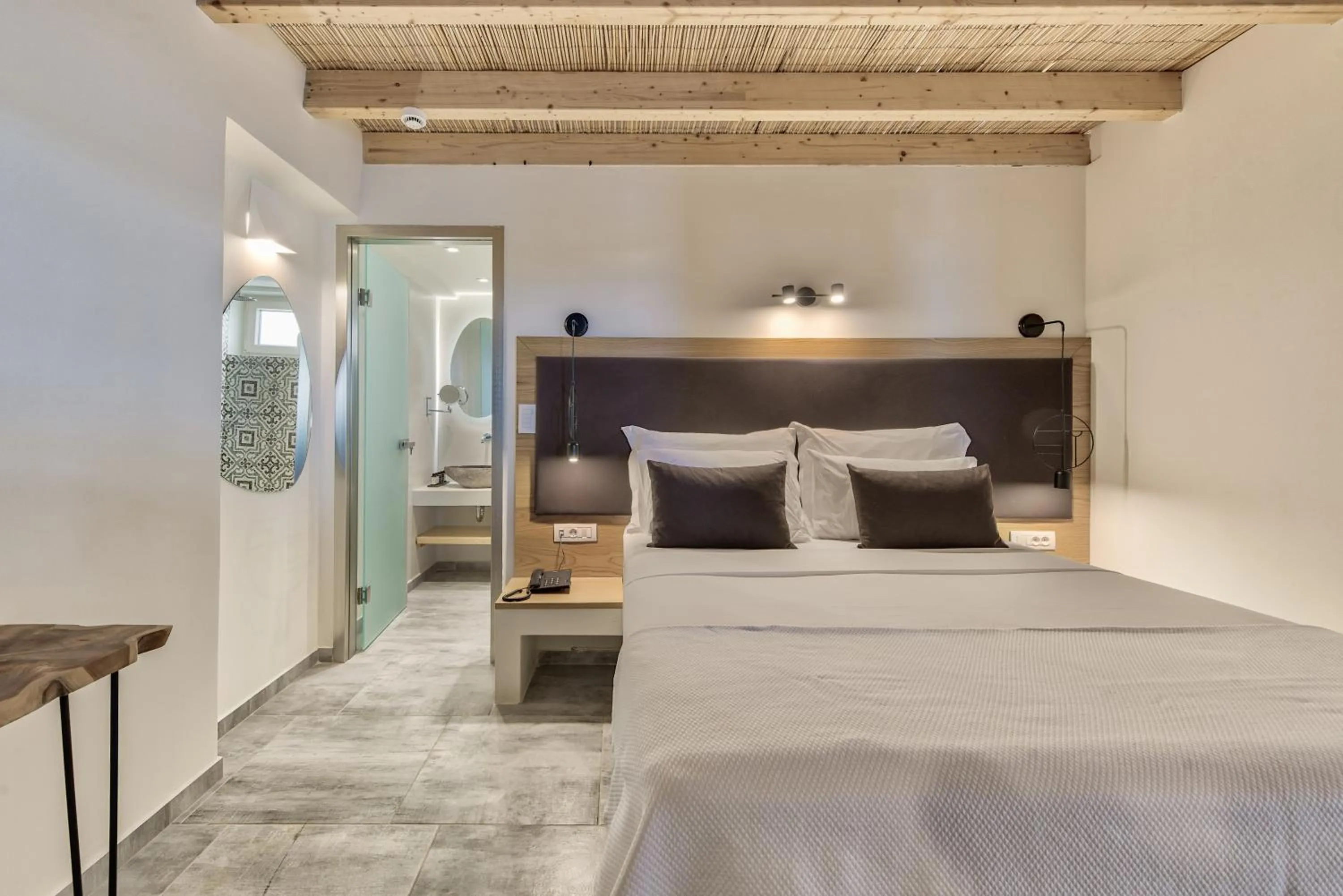 Bed in Aliv stone suites & spa