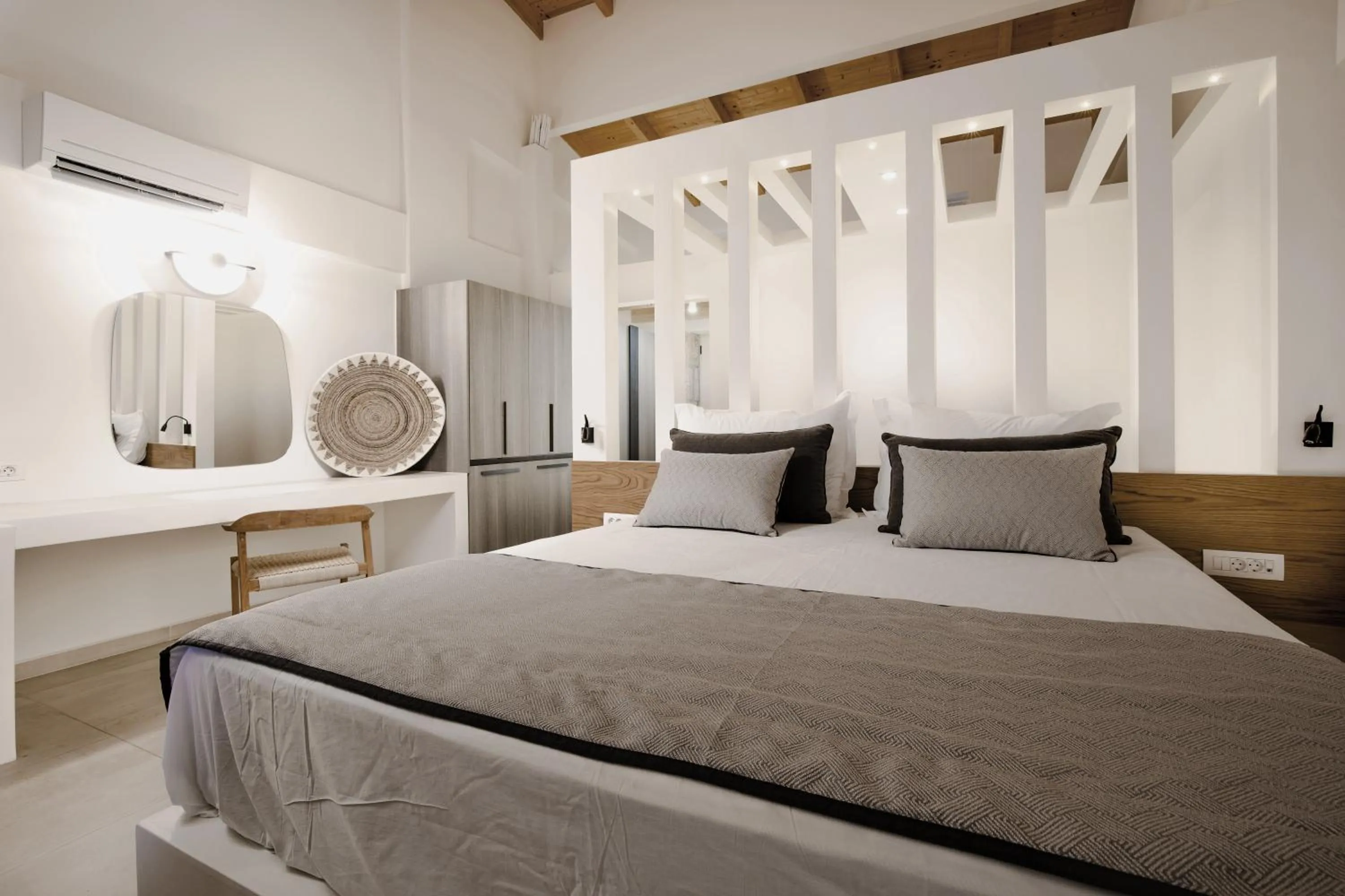 Bed in Aliv stone suites & spa