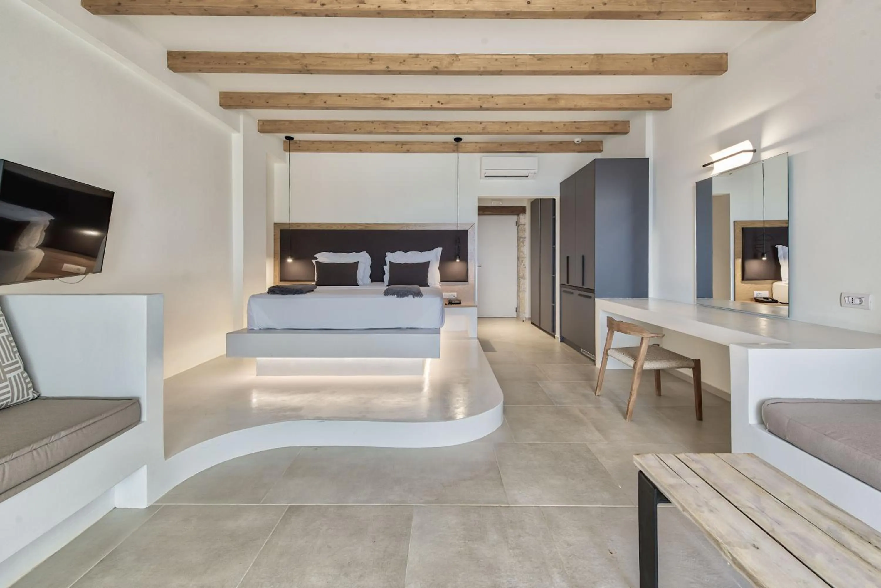 Bed in Aliv stone suites & spa