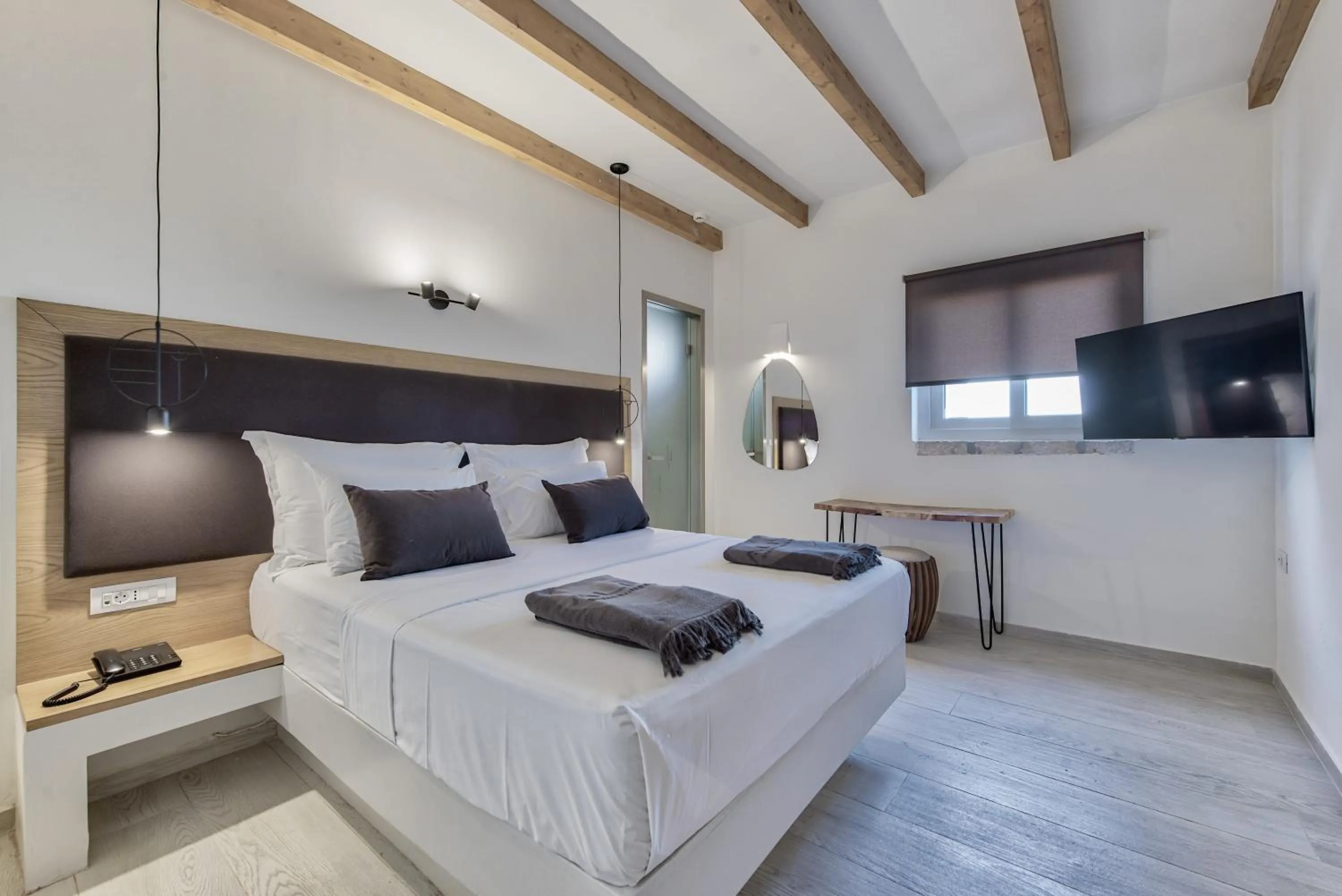 Bed in Aliv stone suites & spa