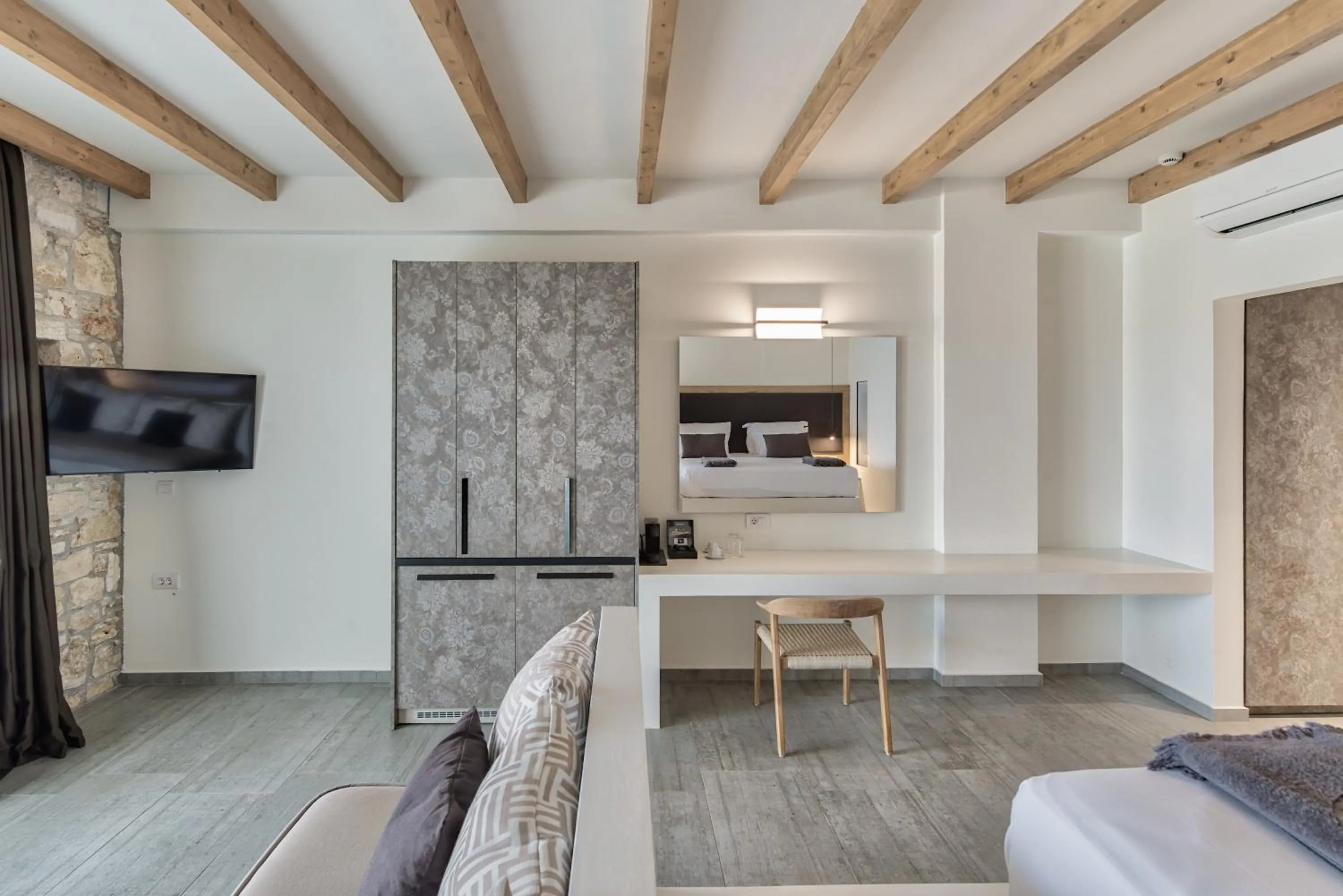 Bed in Aliv stone suites & spa