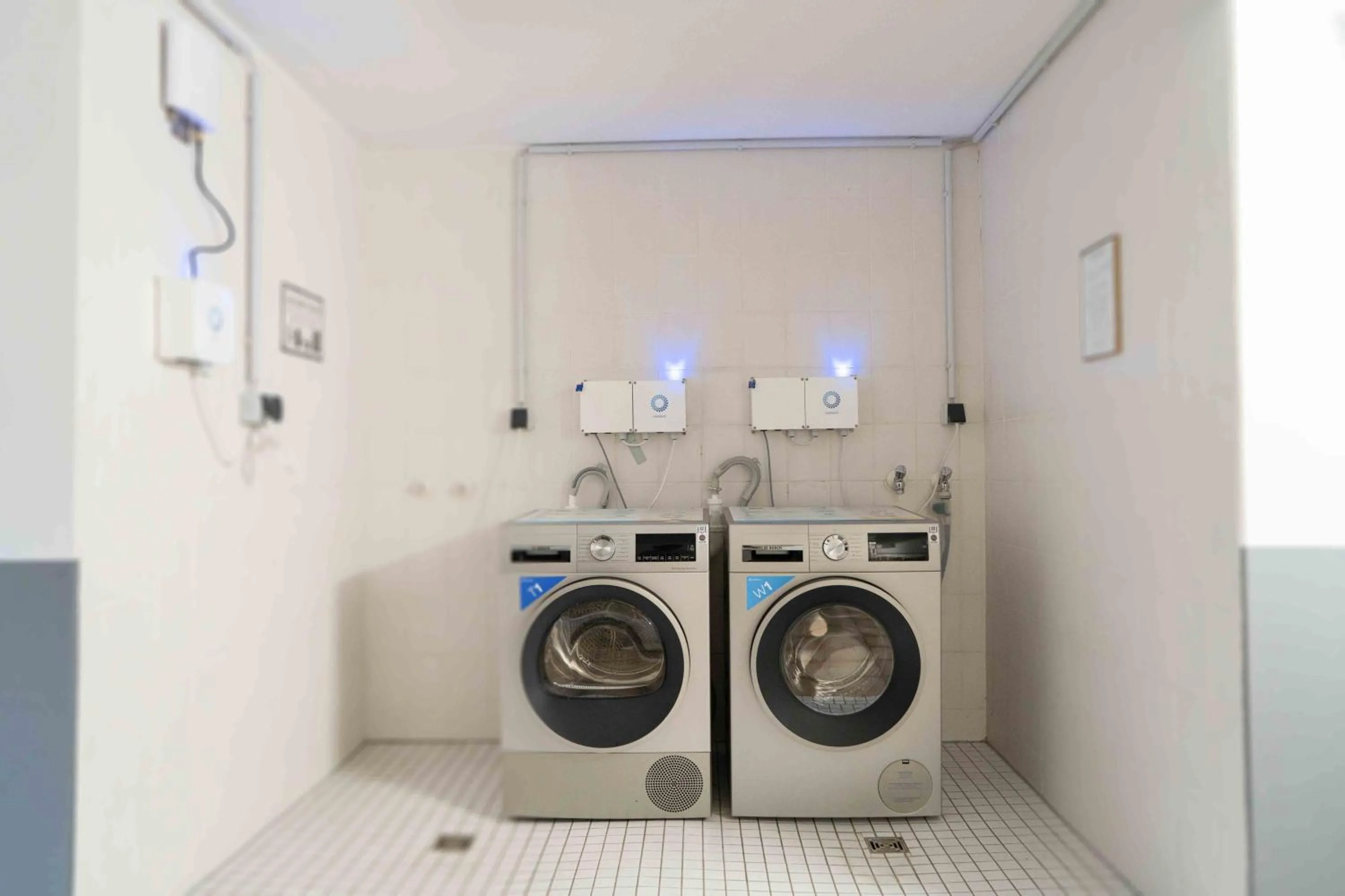 washing machine in Plaza Inn Hannover City Nord