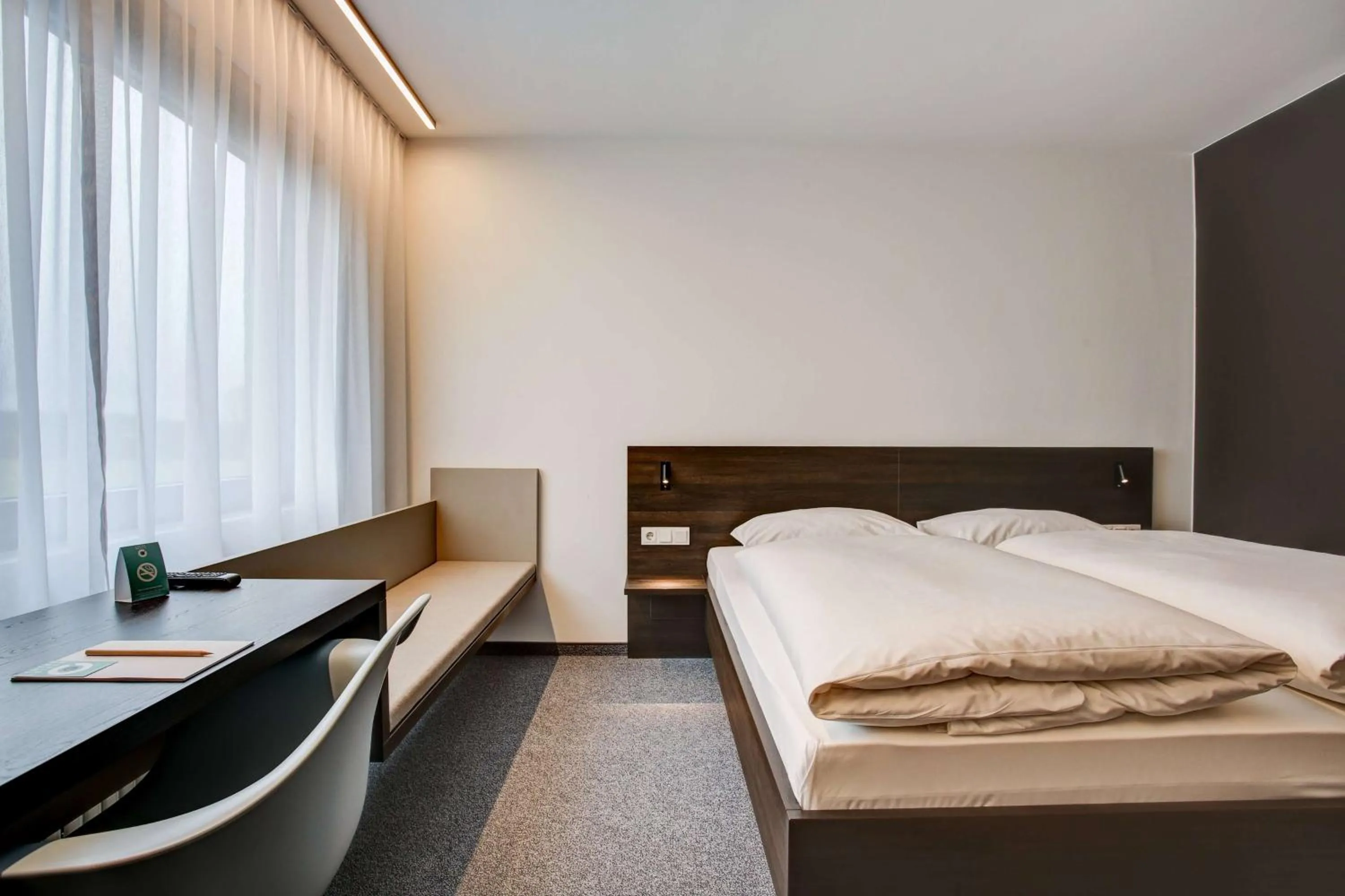 Photo of the whole room, Bed in Centro Park Hotel Stuttgart, Trademark Collection by Wyndham