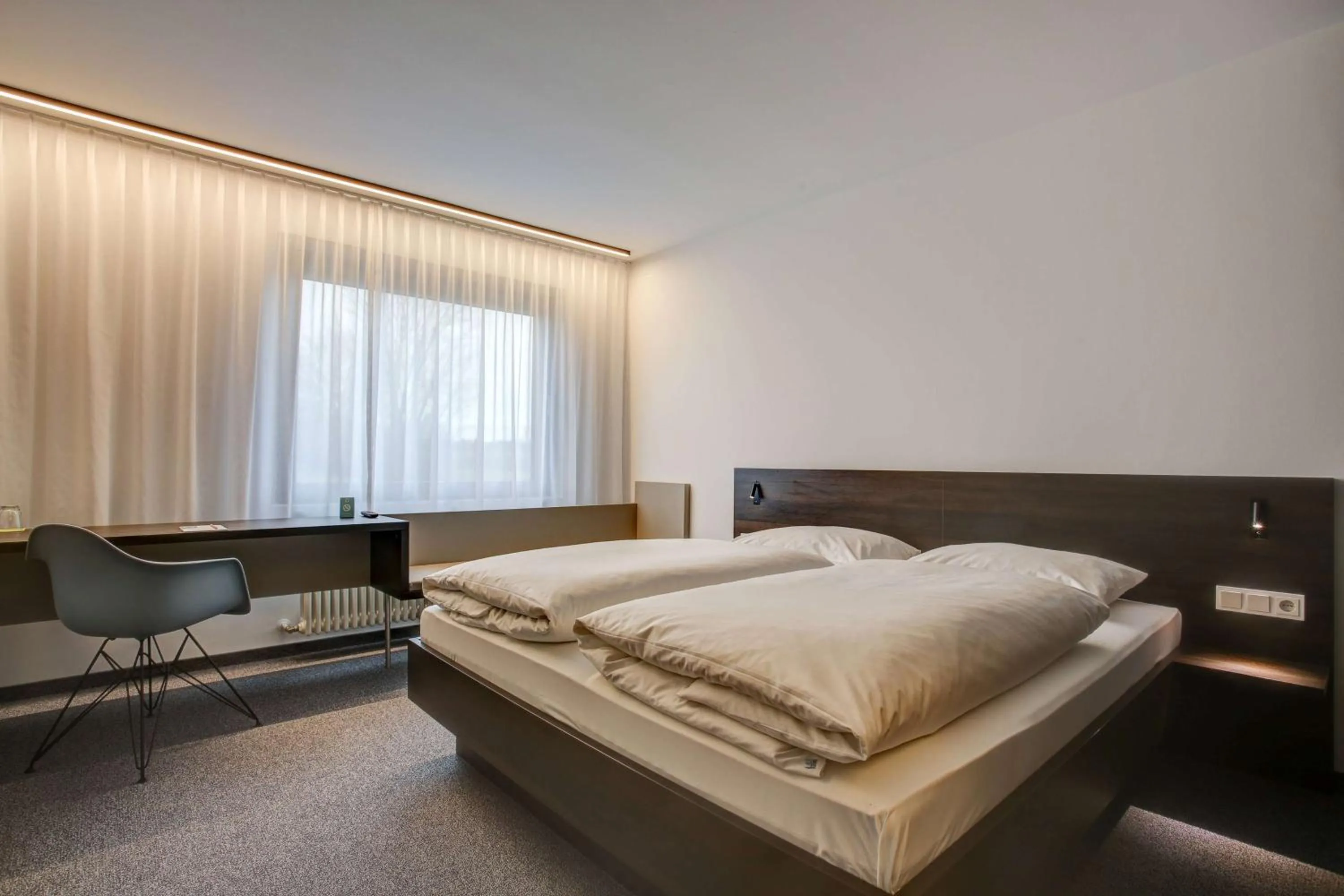 Photo of the whole room, Bed in Centro Park Hotel Stuttgart, Trademark Collection by Wyndham
