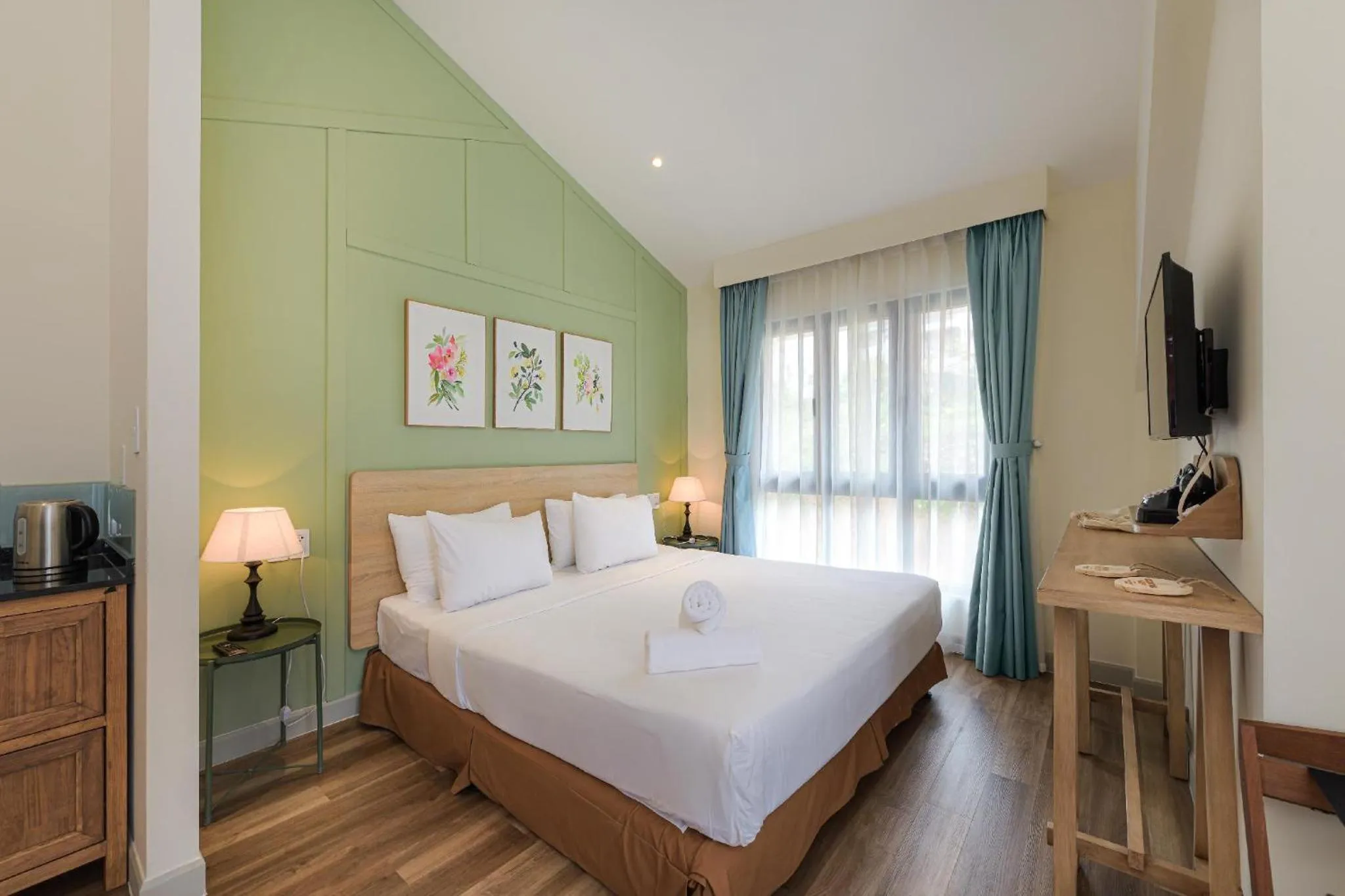 Bed in La Em Boutique Villa