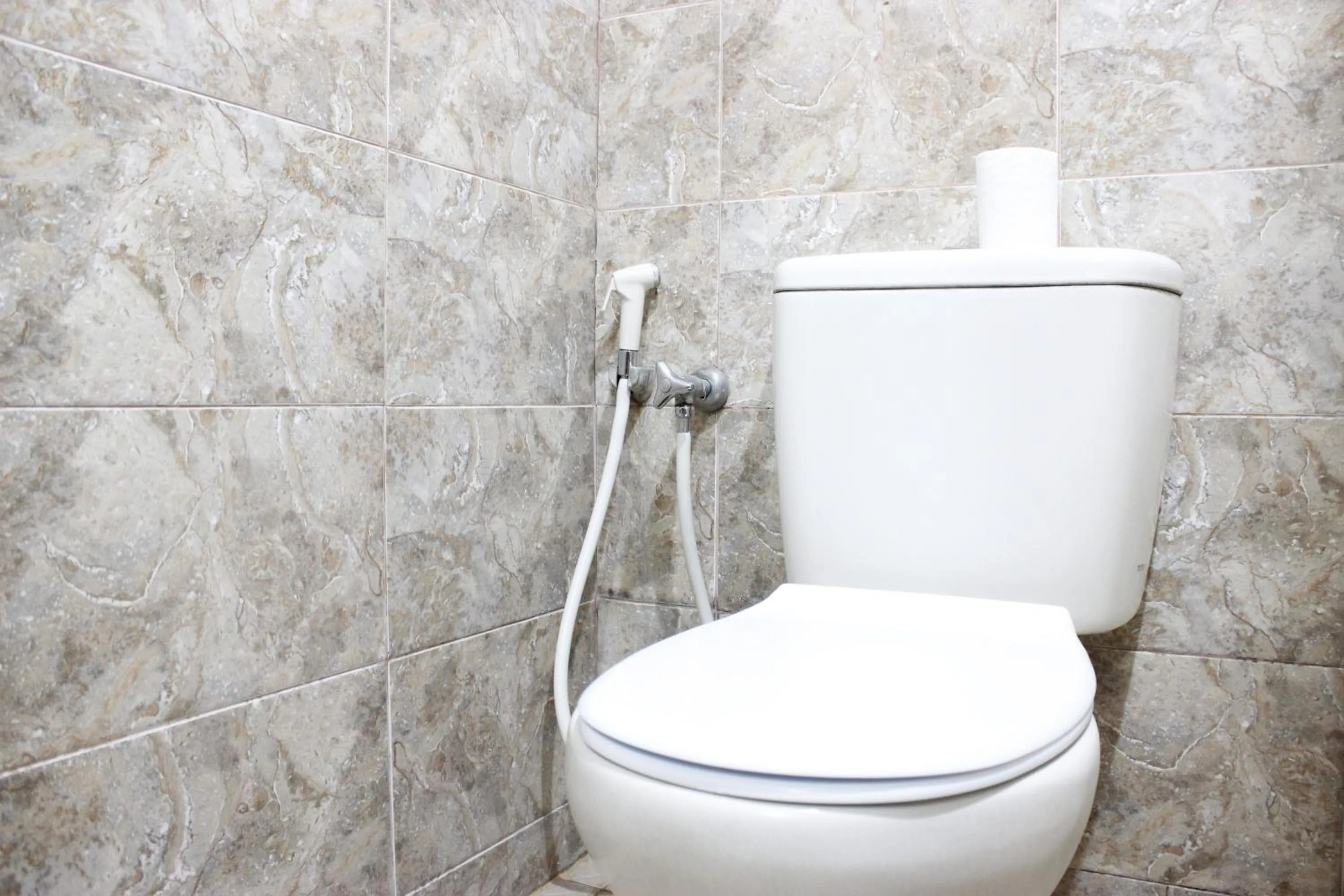 Bathroom in Deluxe & Cozy 4BR Galeri Ciumbuleuit Apartment By Travelio