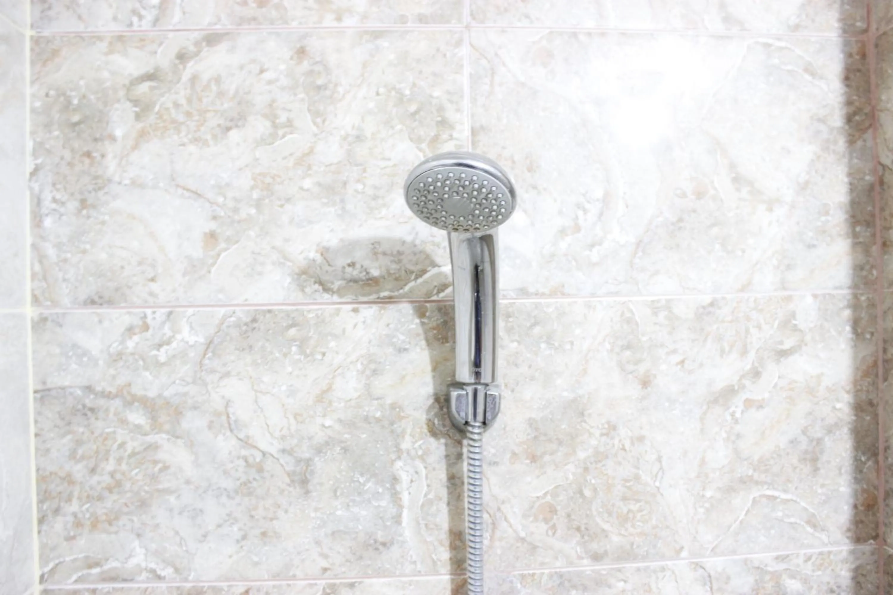 Bathroom in Deluxe & Cozy 4BR Galeri Ciumbuleuit Apartment By Travelio