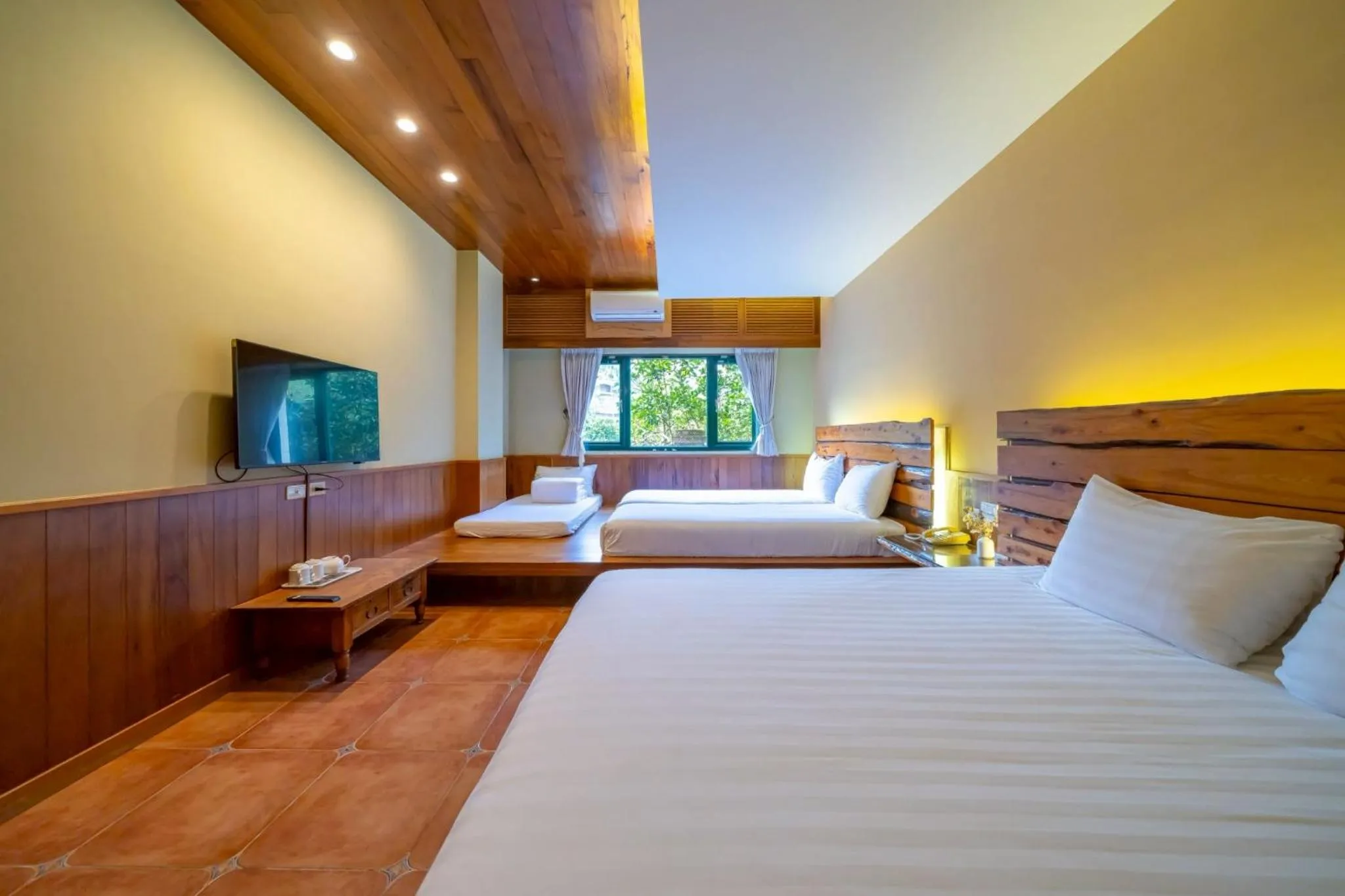 Bed in 檜木屋民宿