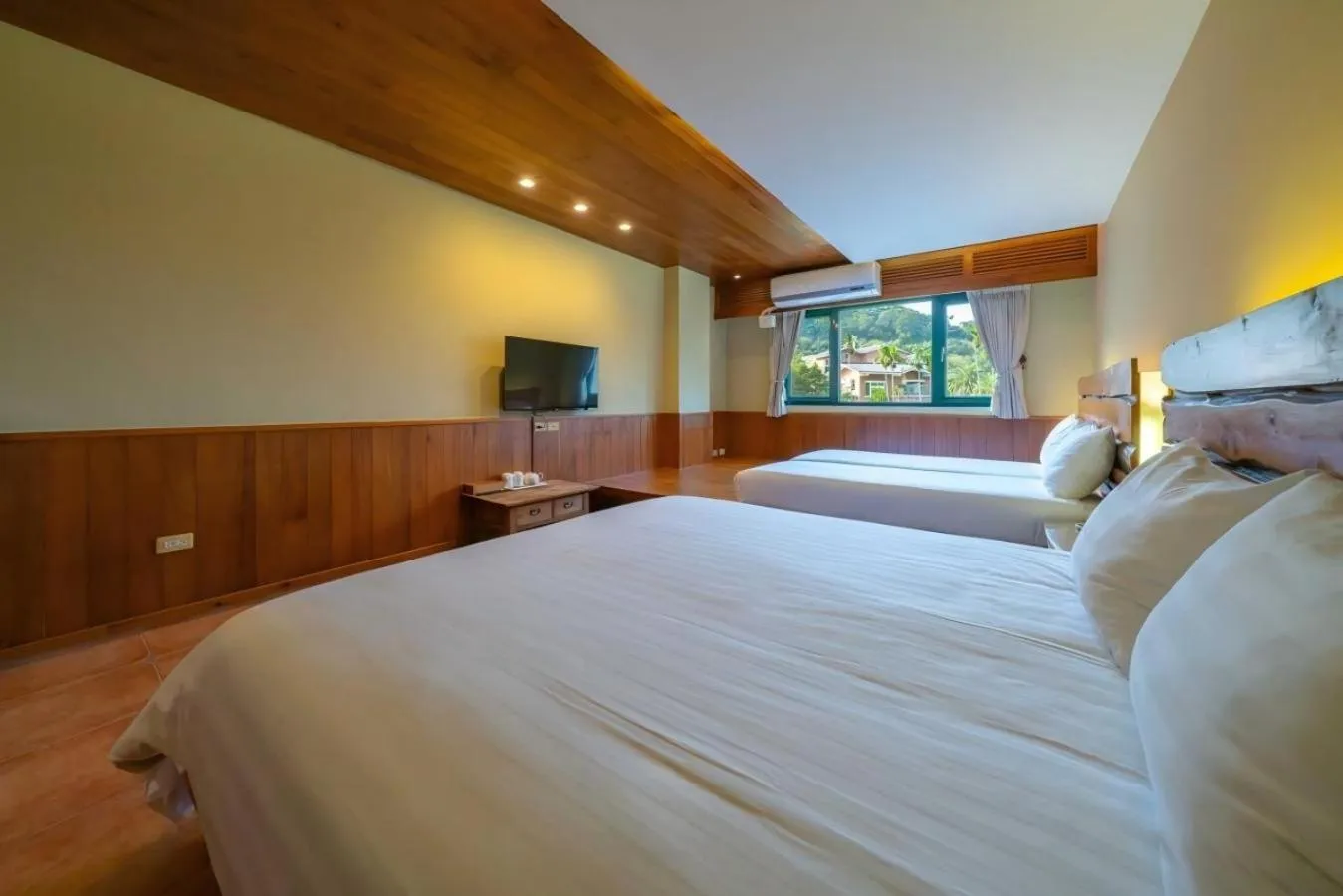 Bed in 檜木屋民宿