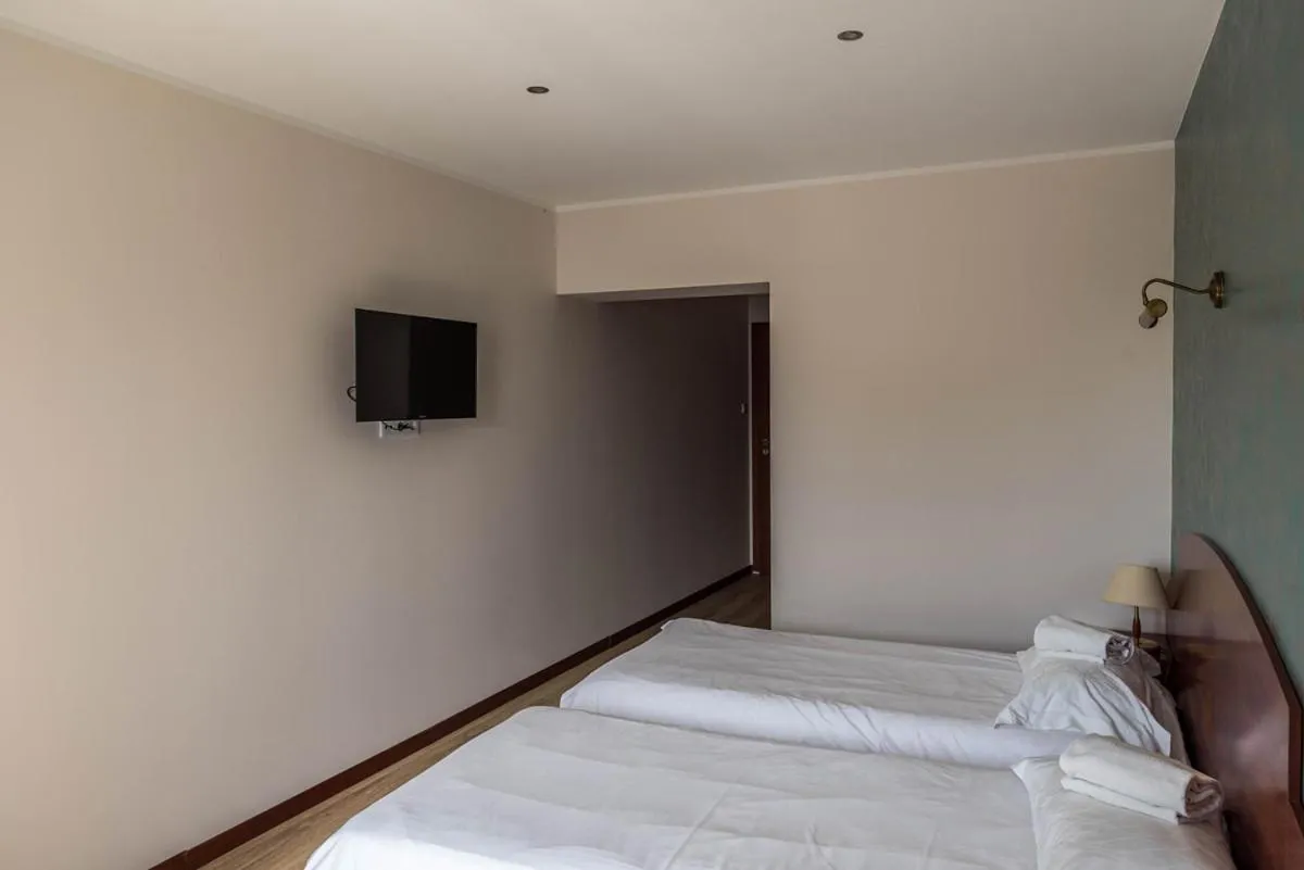 Bed in 4 Pory Roku Resort Sauna & Spa