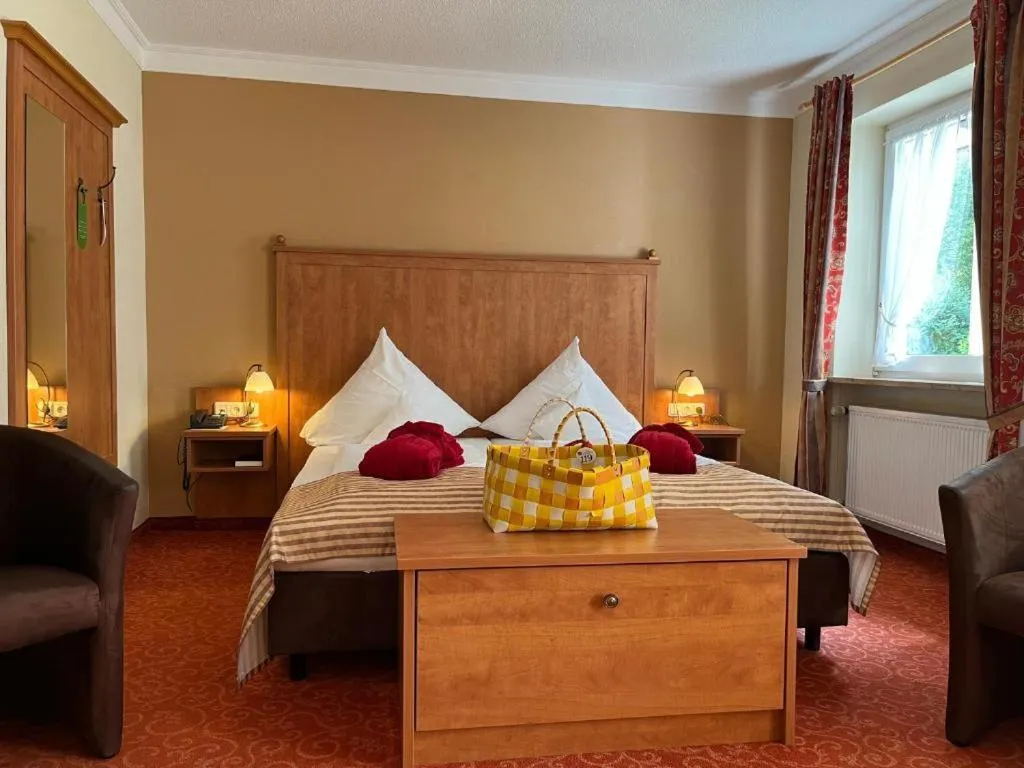Photo of the whole room, Bed in Ringhotel Sonneck