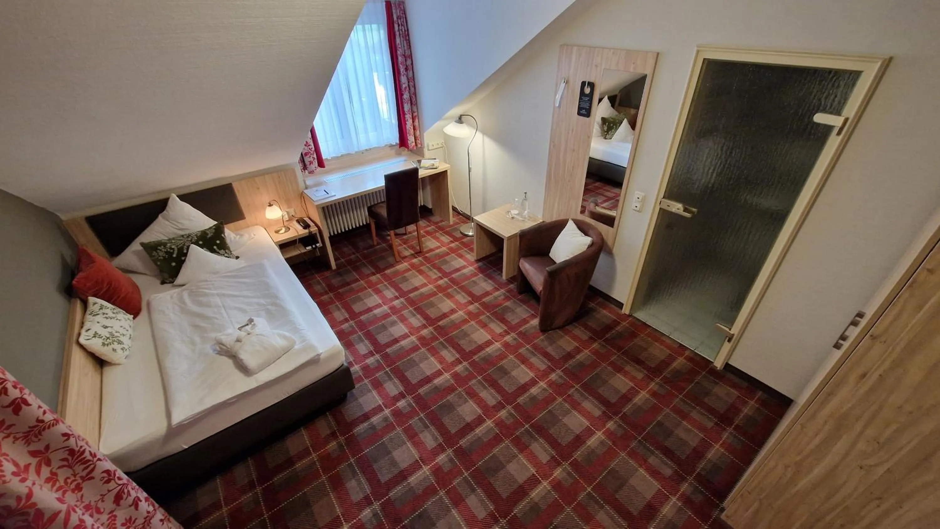 Photo of the whole room, Bed in Ringhotel Sonneck