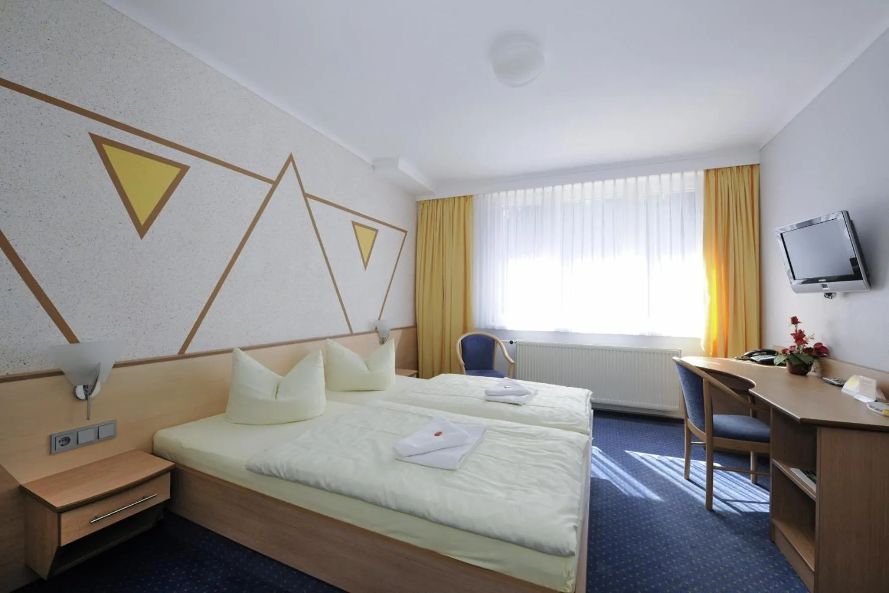 Photo of the whole room, Bed in WAGNERS Sporthotel Oberhof