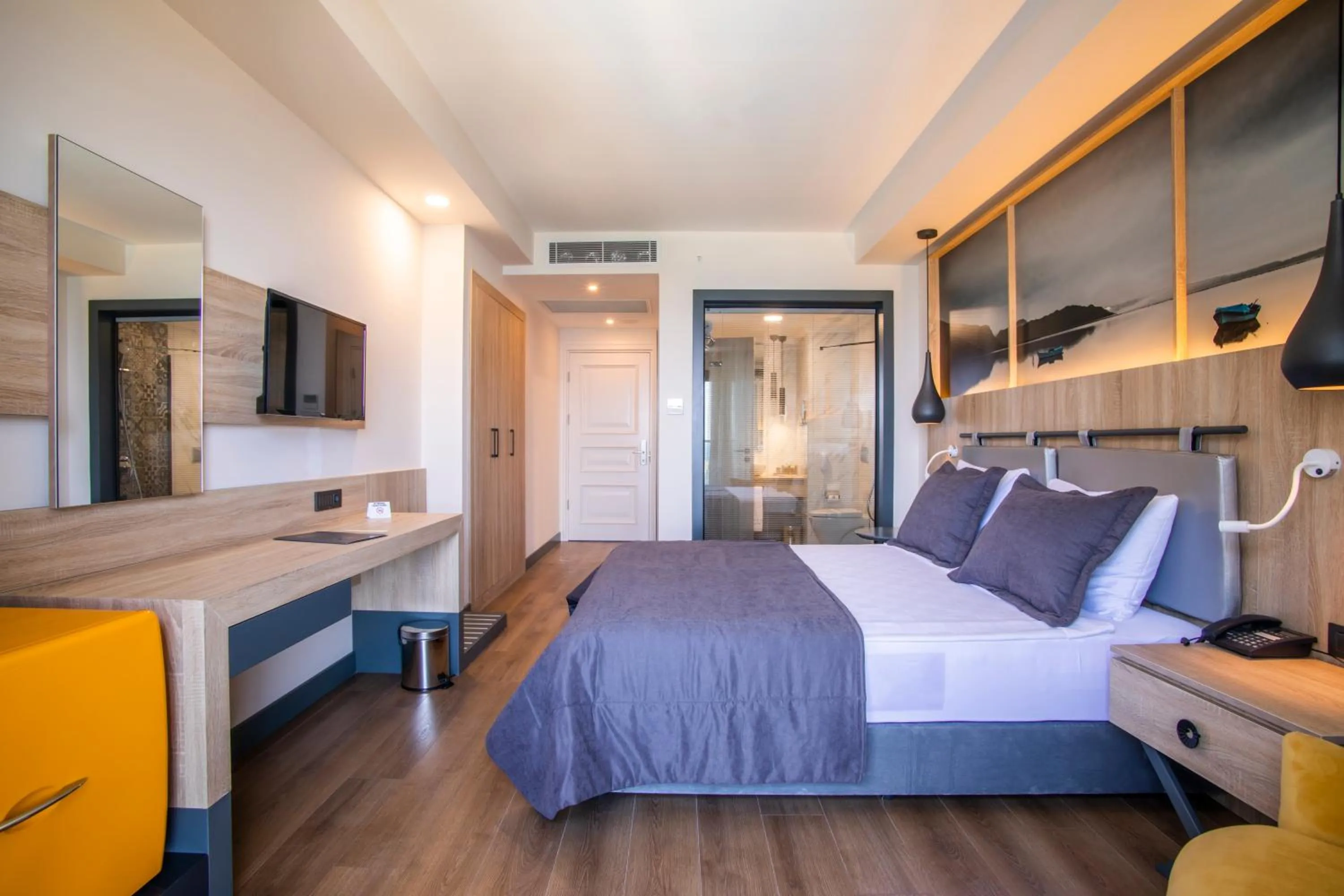 Bed in MAIA Luxury Beach Hotel & Spa