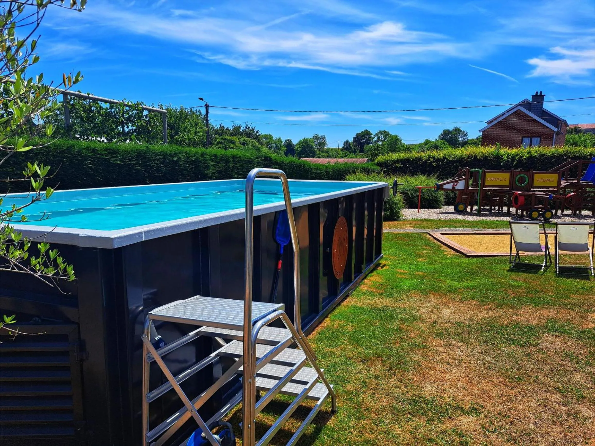 Swimming pool in Hotel & Restaurant Maison Pal'Ange