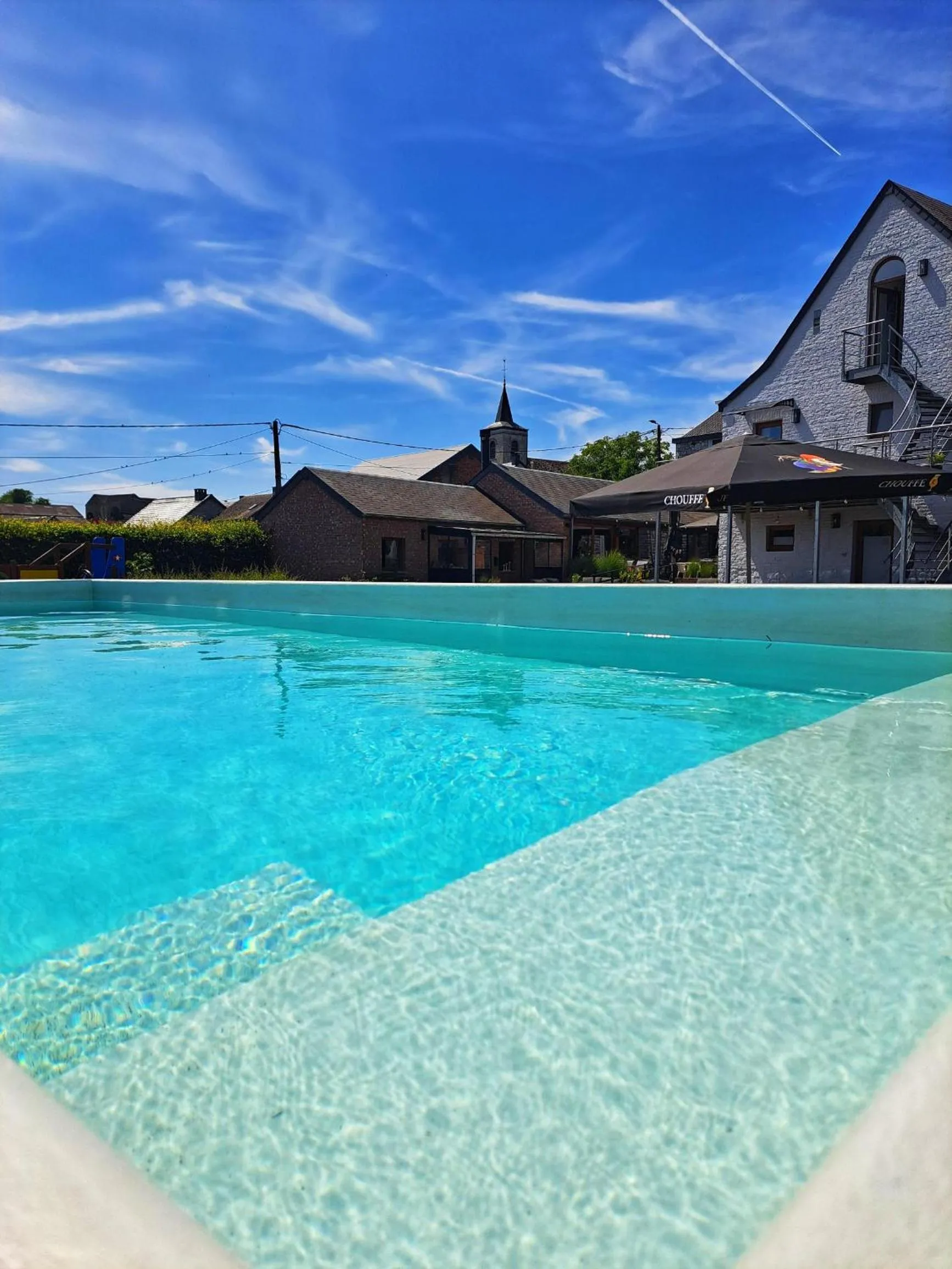 Swimming pool in Hotel & Restaurant Maison Pal'Ange