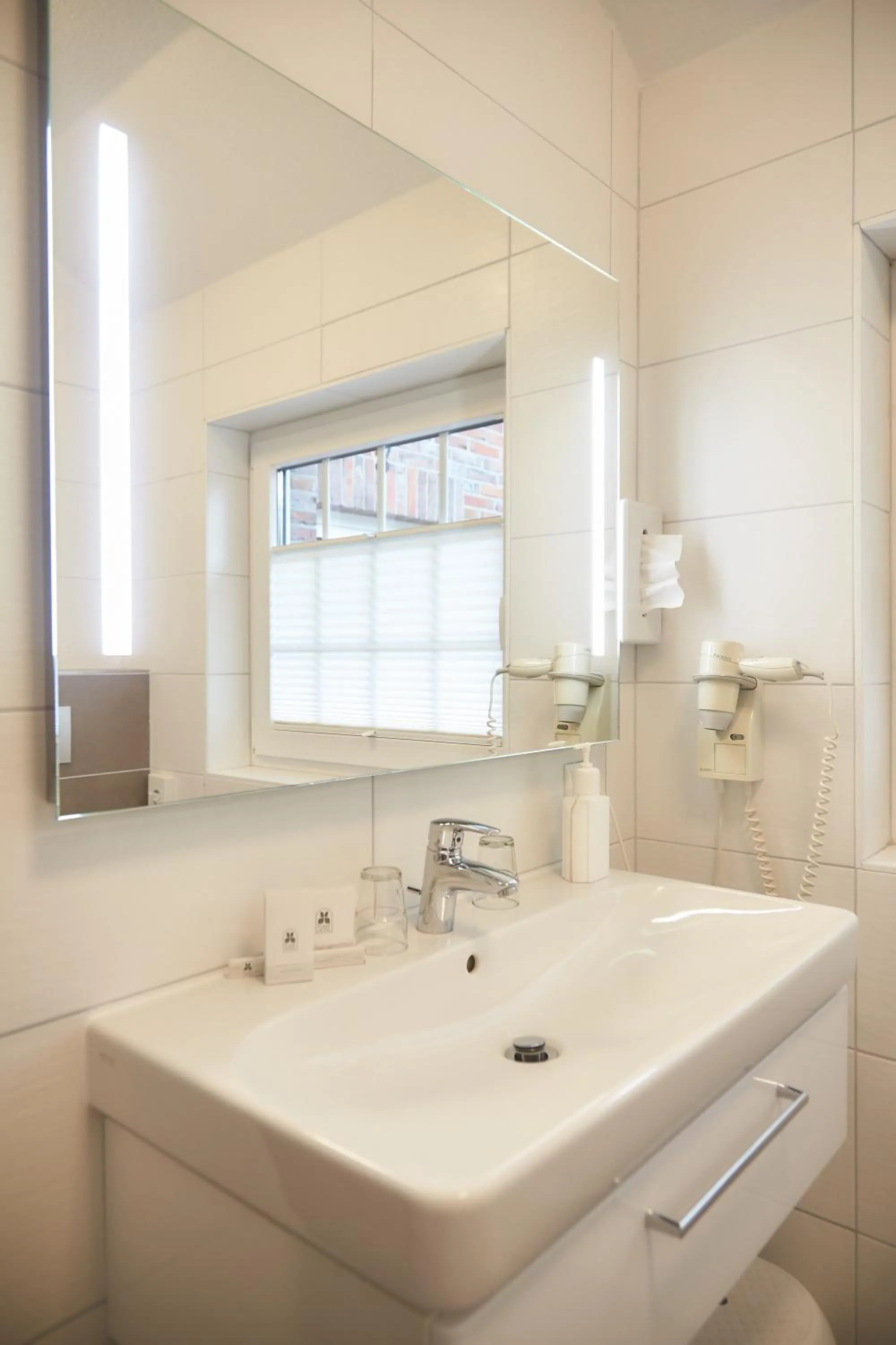 Bathroom in Flairhotel Hubertus