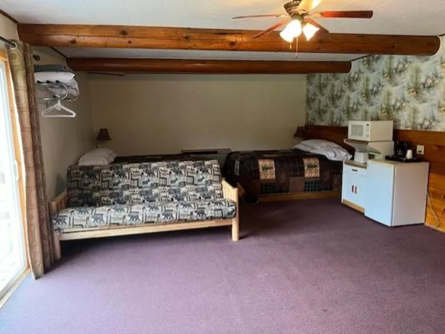 Bed in Springcreek Inn