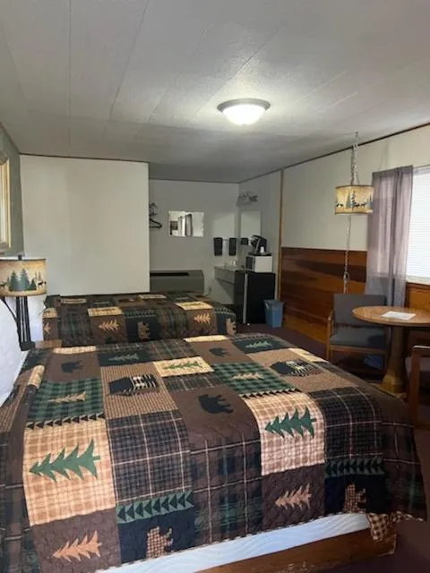 Bed in Springcreek Inn