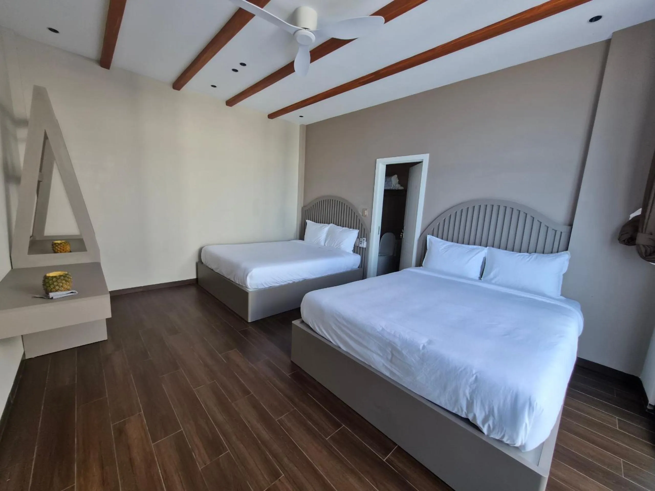 Bed in Chai Village Hotel