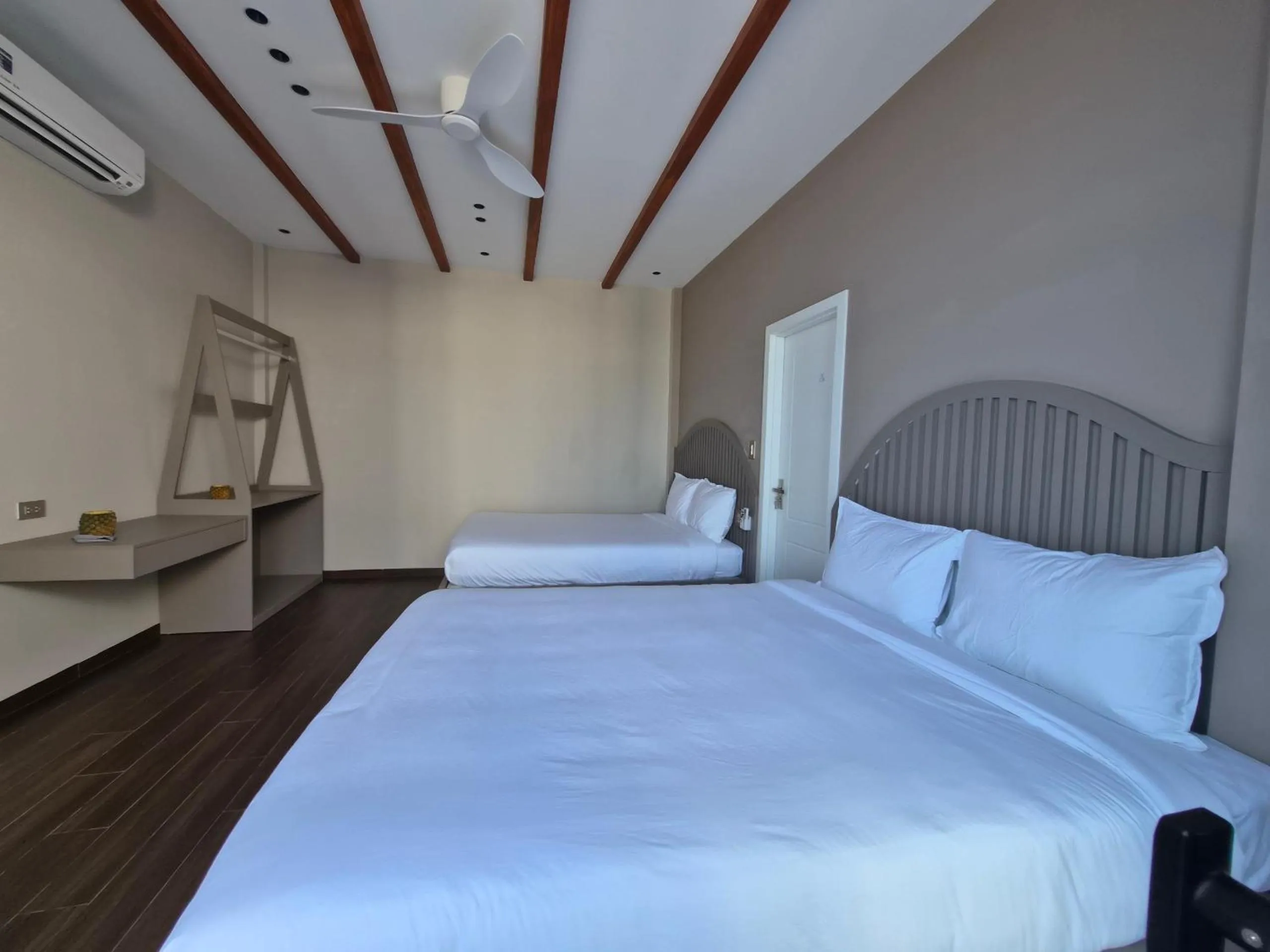 Bed in Chai Village Hotel