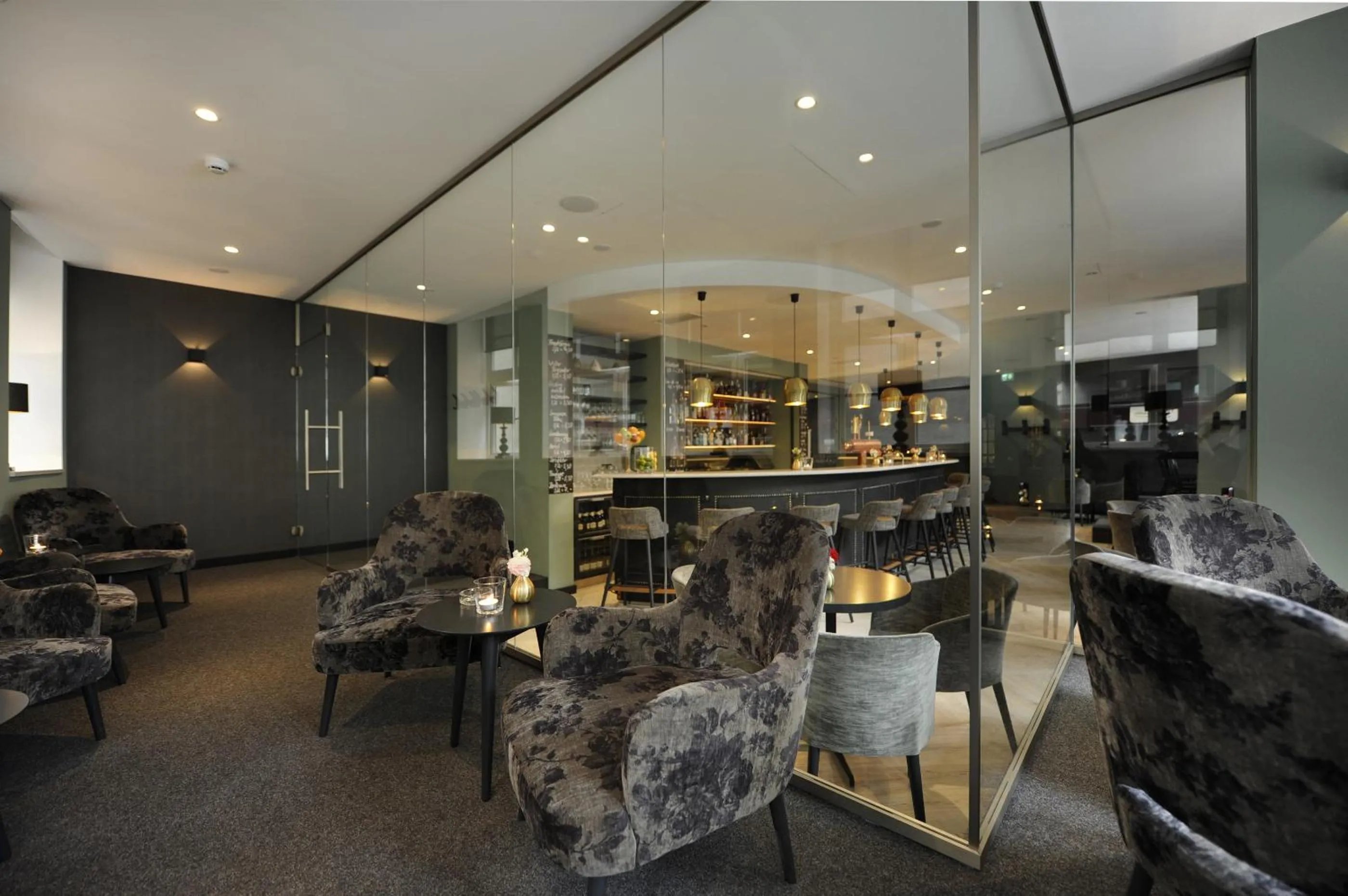 Communal lounge/ TV room in Van der Valk Hotel Hildesheim