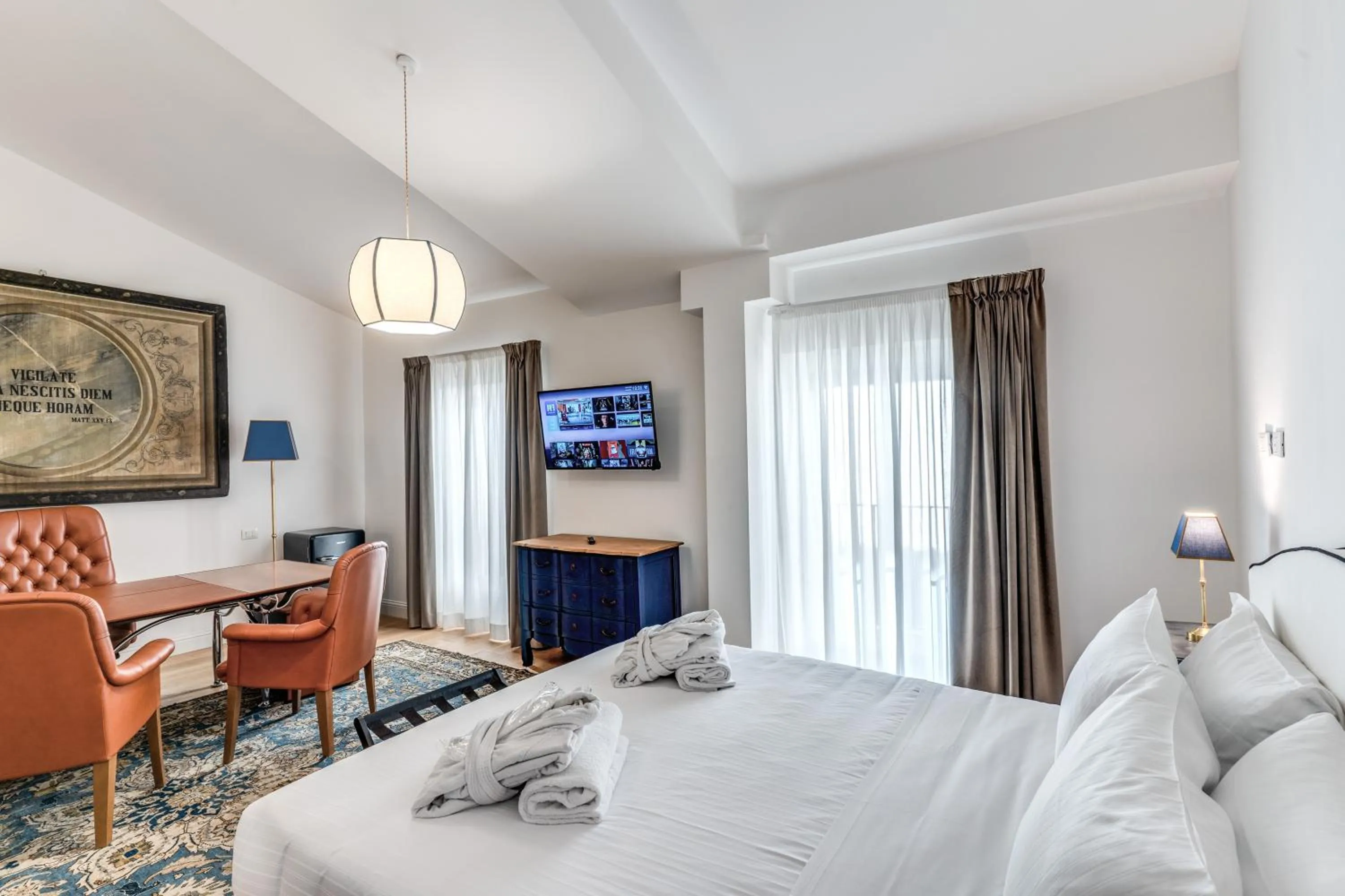 Photo of the whole room, Bed in Suite della Pigna