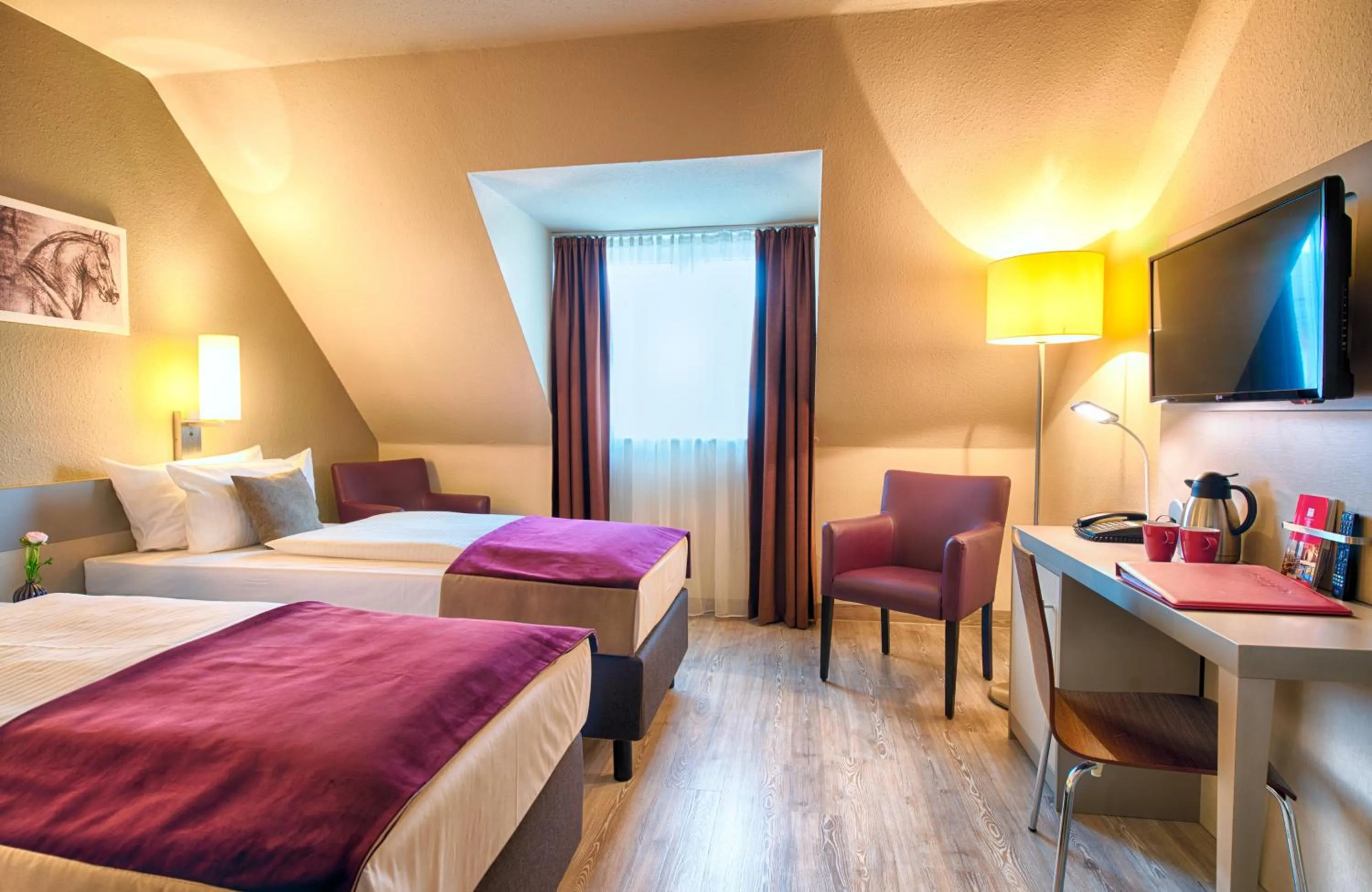 Photo of the whole room, Bed in Leonardo Hotel Mannheim-Ladenburg