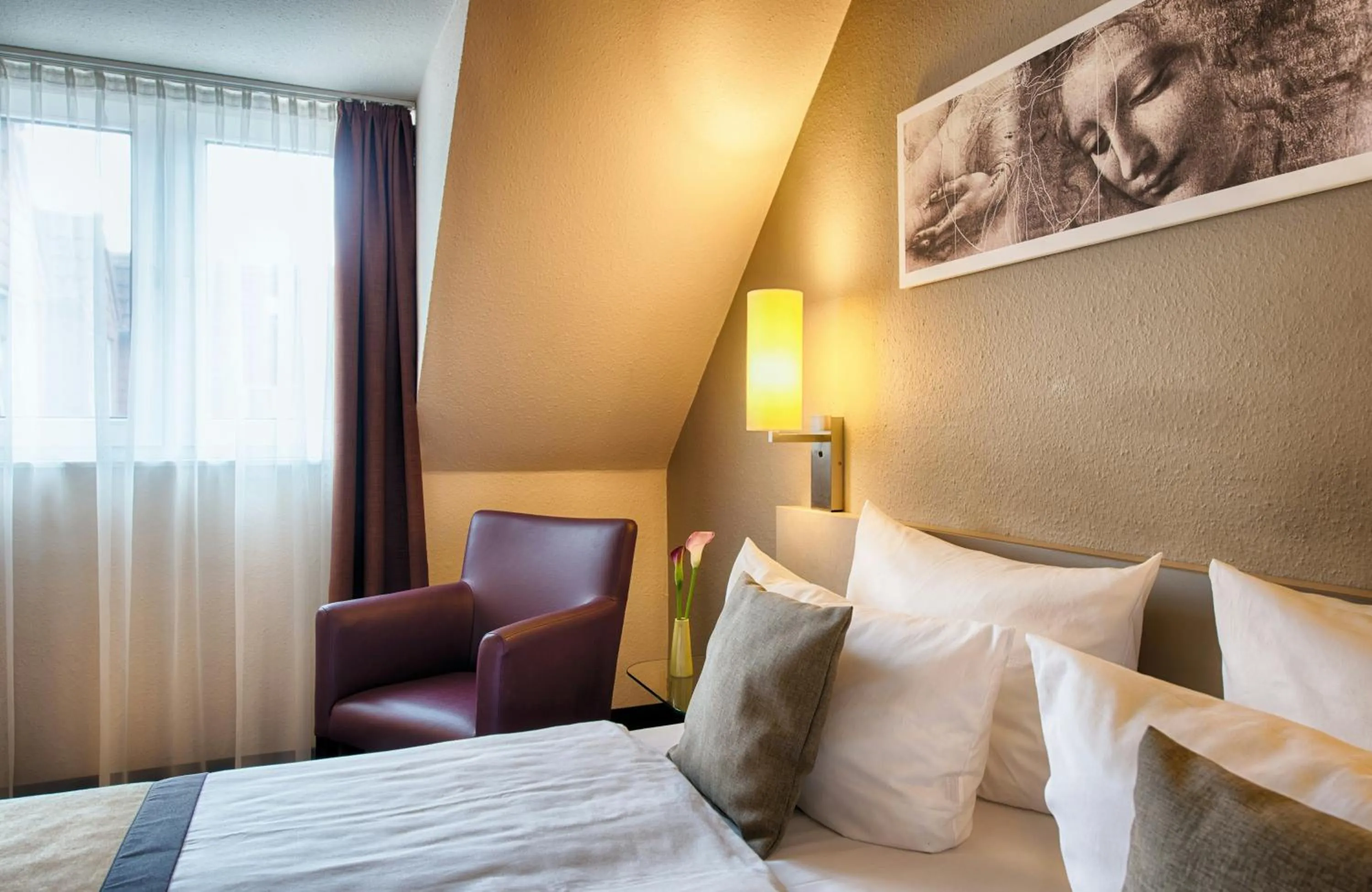Photo of the whole room, Bed in Leonardo Hotel Mannheim-Ladenburg