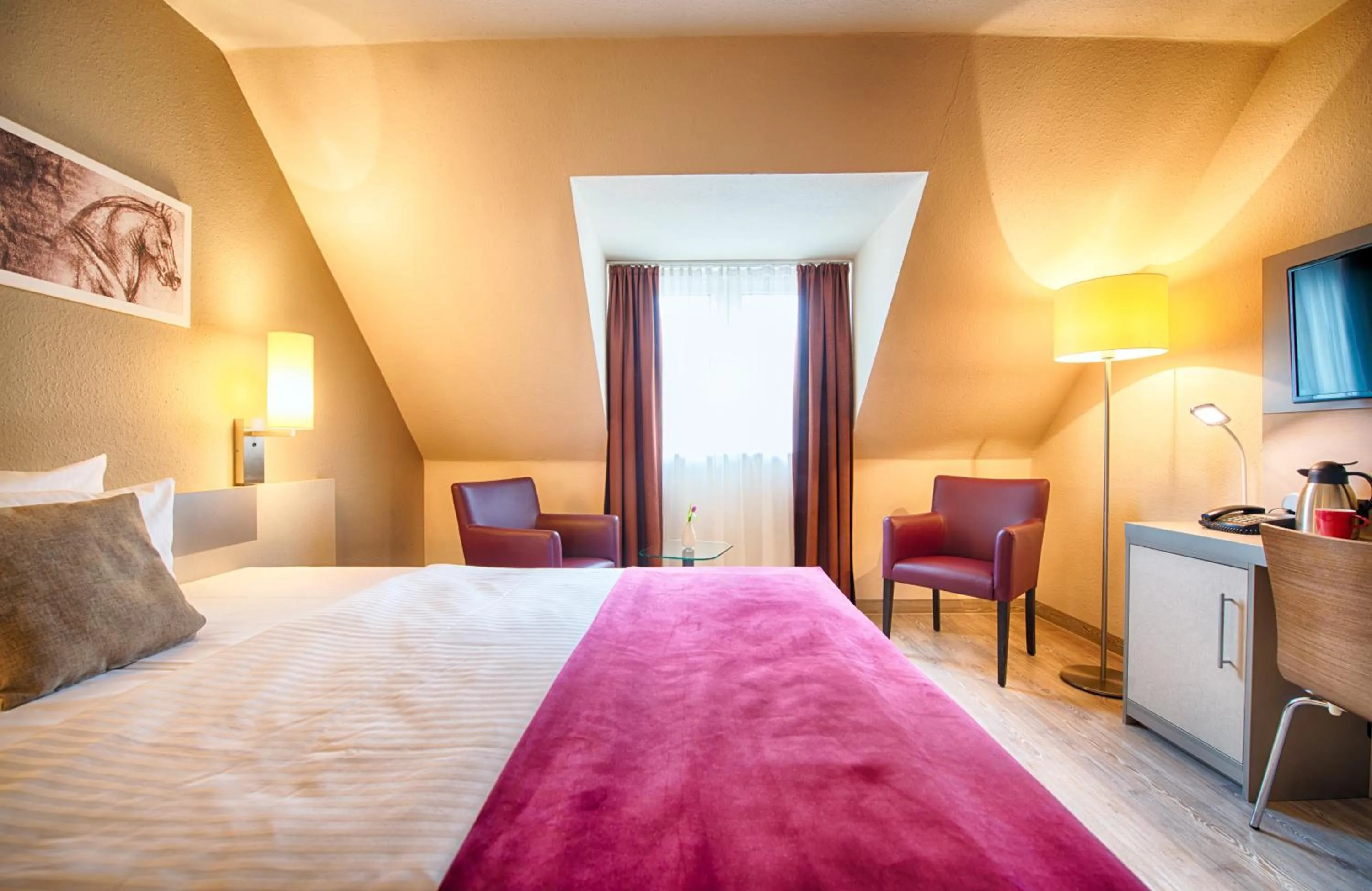 Photo of the whole room, Bed in Leonardo Hotel Mannheim-Ladenburg