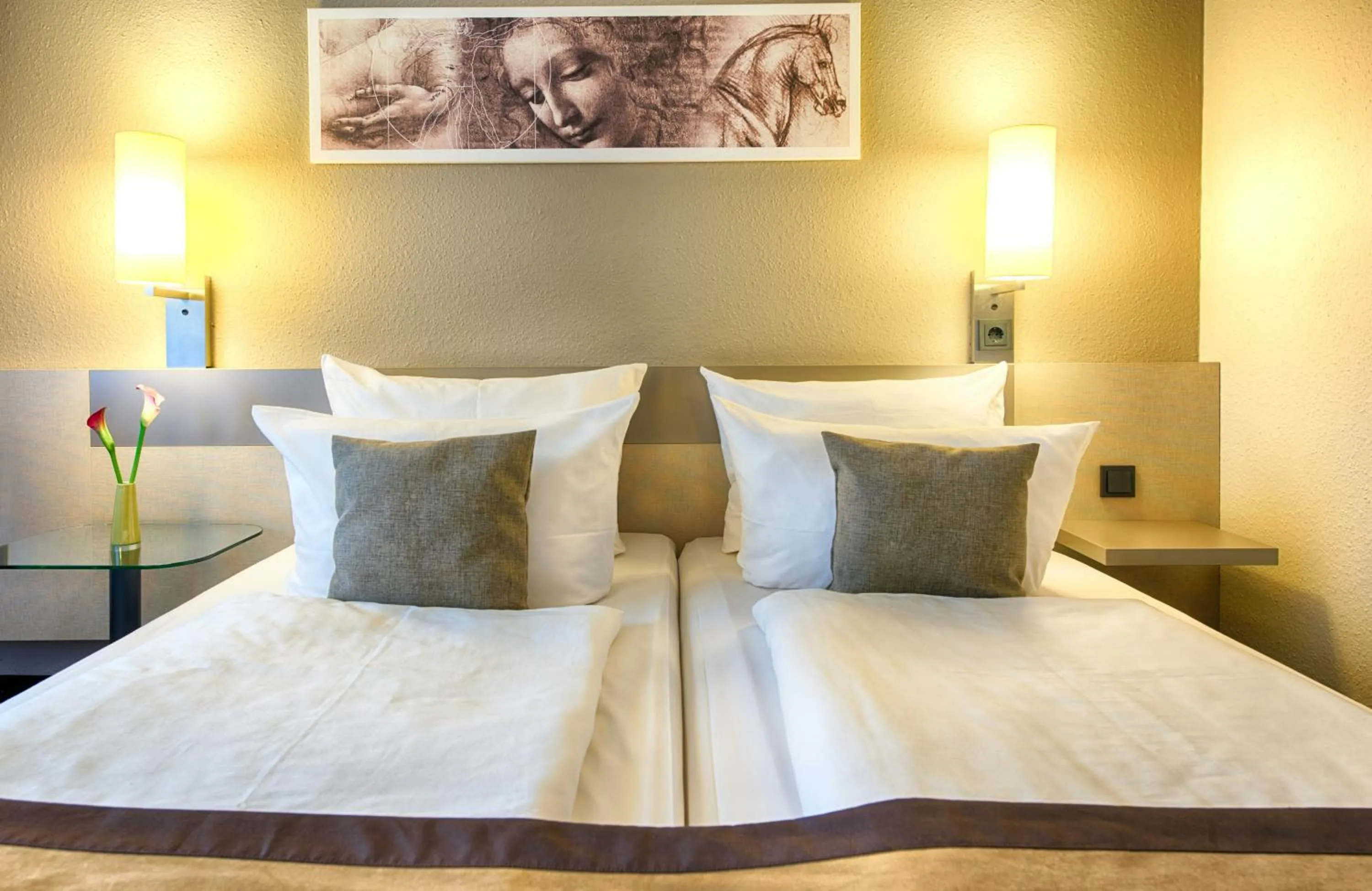 Photo of the whole room, Bed in Leonardo Hotel Mannheim-Ladenburg