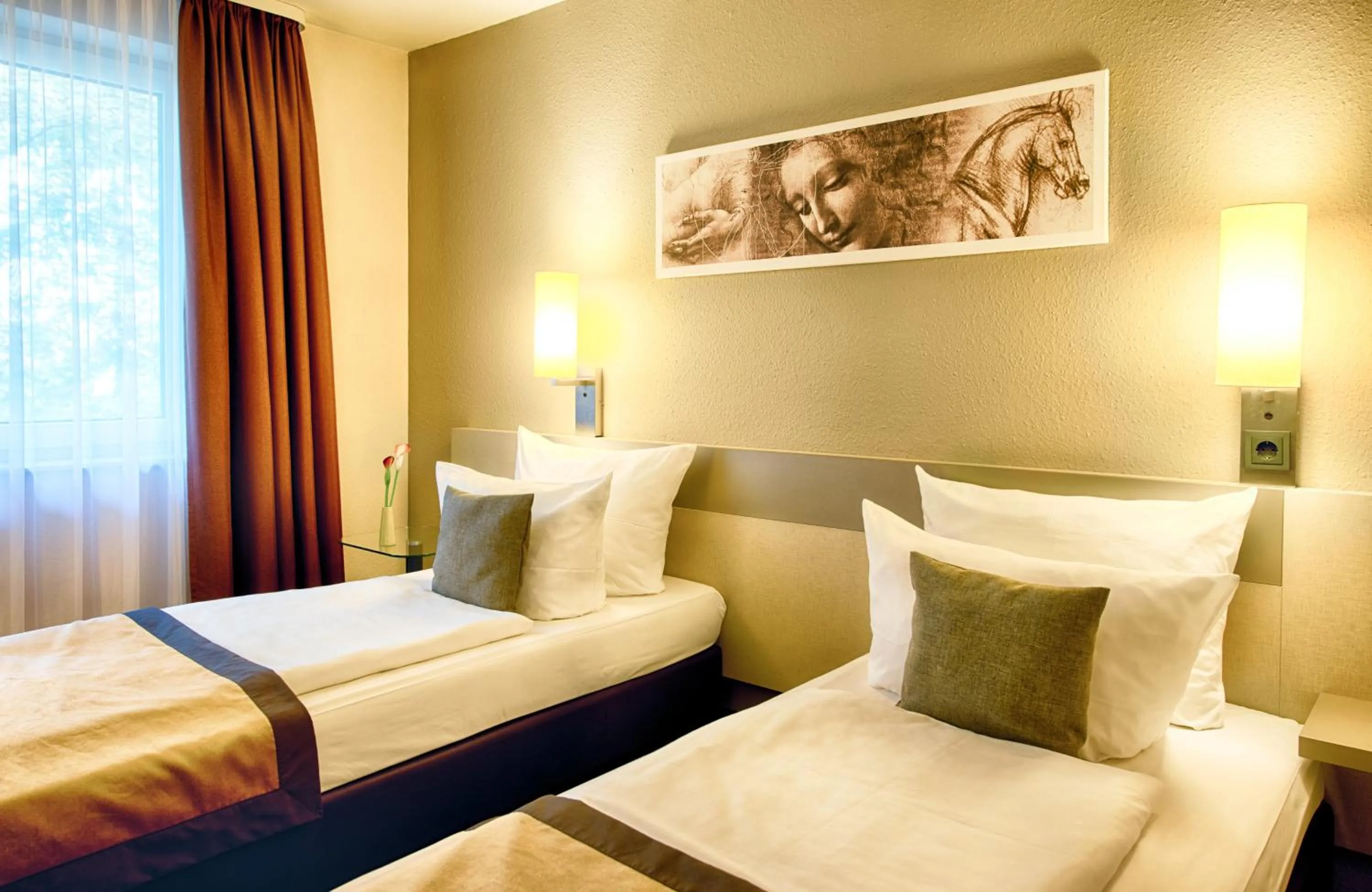 Photo of the whole room, Bed in Leonardo Hotel Mannheim-Ladenburg